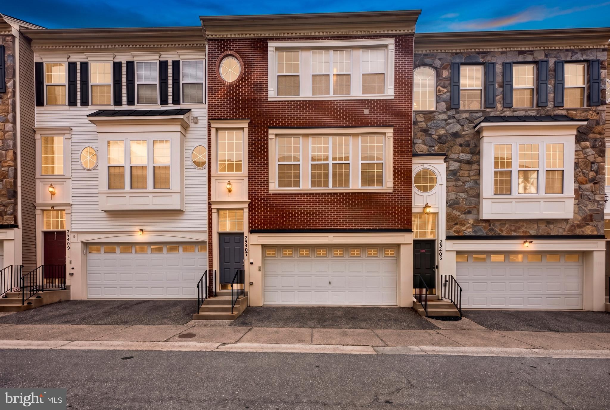 Tucked within the sought-after Magruders Overlook community, this spacious Damascus townhome blends warmth, scale, and functionality across beautifully finished living spaces designed for modern everyday living. **Recently refreshed with fresh interior paint throughout**, this well-maintained home, built in 2004, offers 3 Bedrooms, 2 Full Baths, 2 Half Baths, and a versatile layout that lives comfortably on every level.

The main level unfolds with expansive rooms, elegant crown molding, and an effortless flow ideal for both entertaining and quiet evenings at home. Natural gathering spaces define the interior, from the oversized family room to the inviting living area anchored by a cozy gas fireplace...the kind of space that naturally becomes the heart of the home during cool evenings and holiday gatherings alike.

At the center of it all, the beautifully designed kitchen offers generous cabinetry, abundant prep space, and easy connection to the separate dining room, creating a layout equally suited for casual weekday meals or larger celebrations with friends and family.

Upstairs, spacious bedrooms provide flexibility for guests, remote work, or changing lifestyle needs, while the primary suite delivers comfort and privacy with ample space to recharge at the end of the day.

The fully finished lower level adds tremendous versatility with an enormous recreation room ready for movie nights, game days, fitness equipment, play space, or additional entertaining. Rarely does a townhome offer this much functional living area while still maintaining warmth and cohesion throughout.

Outside, the attached 2-car garage adds convenience and additional storage, while the location places you moments from parks, shopping, dining, and commuter routes that make daily life effortless.

Combining generous proportions, timeless features, **freshly painted interiors**, and an exceptional Damascus location, this Magruders Overlook residence delivers the space, comfort, and flexibility today's buyers are searching for.