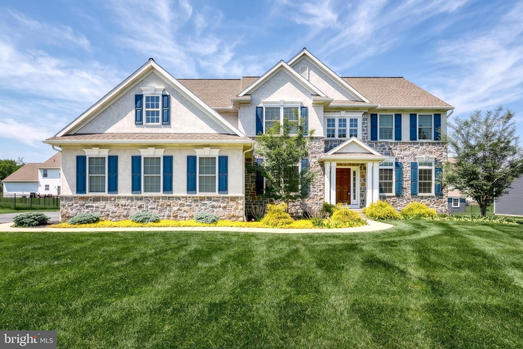 Nestled in the serene community of Strathford Meadows, this exquisite traditional home, built in 2021, offers a perfect blend of luxury and comfort. Spanning over 3,354 square feet, this residence features four spacious bedrooms and three and a half elegantly appointed bathrooms, ensuring ample space for relaxation and privacy. Step inside to discover a warm and inviting atmosphere, highlighted by luxury vinyl plank flooring and plush carpeting that enhance the home's cozy appeal. The heart of the home is the gourmet kitchen, complete with quartz countertops, a central island, and high-end appliances, including a built-in microwave, gas range, and dishwasher, making it a chef's dream. The adjoining dining area is perfect for intimate gatherings or festive celebrations. Retreat to the primary suite, where a lavish bathroom awaits, featuring a jetted tub and a walk-in shower, providing a spa-like experience at home. The primary bedroom boasts generous walk-in closets, ensuring ample storage. The living area is graced by a stunning gas fireplace with glass doors, creating a focal point for cozy evenings. Recessed lighting and ceiling fans throughout add to the home's modern elegance. Outside, the property sits on a generous 0.34-acre lot, complemented by a side-entry three-car garage. Enjoy the benefits of a PV solar array, enhancing energy efficiency. This home is not just a residence, it's a lifestyle of luxury and comfort waiting to be embraced.