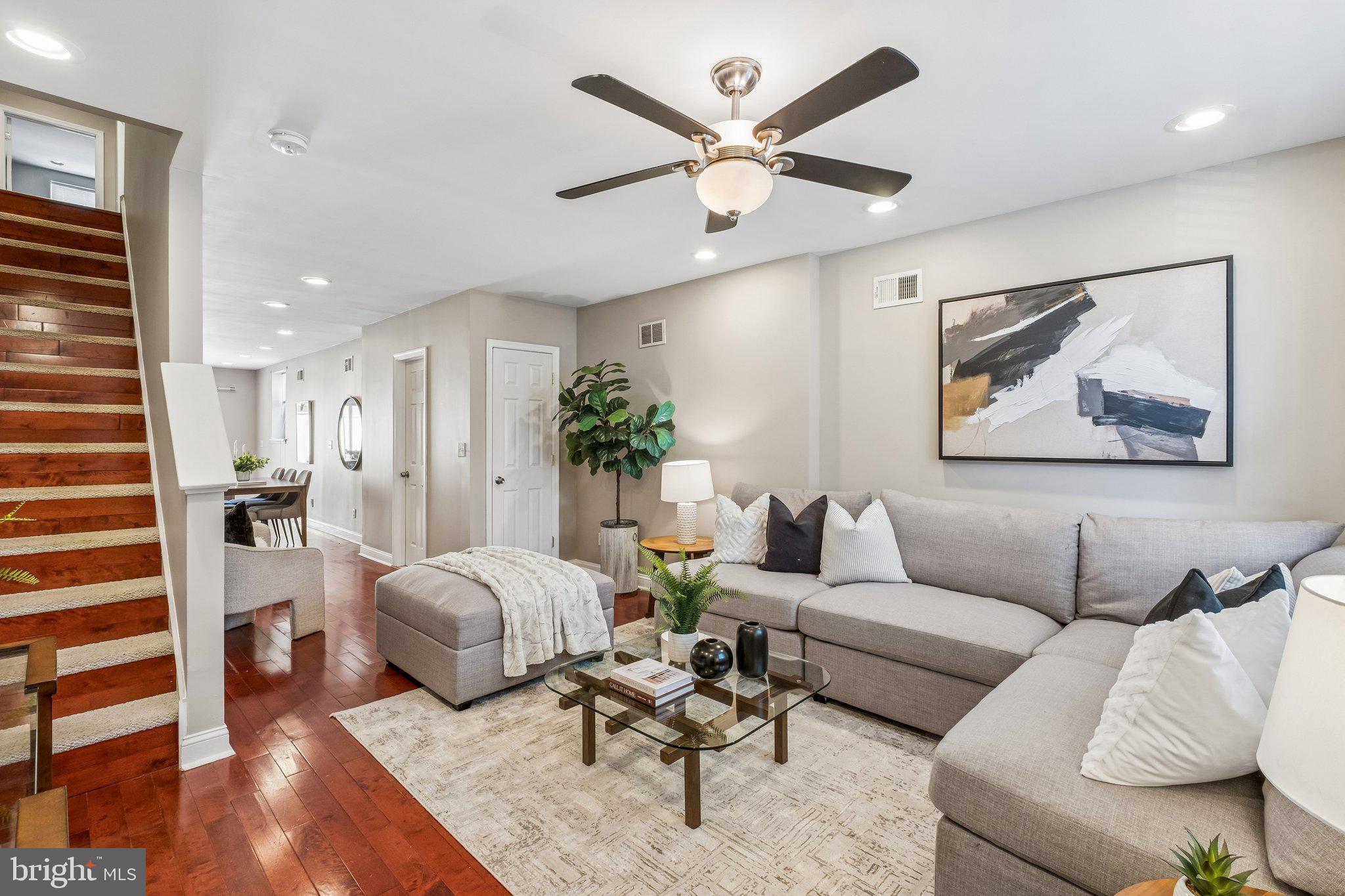 Welcome to 1020 S. 24th Street, a beautifully maintained Graduate Hospital rowhome featuring a timeless original brick façade that delivers exceptional curb appeal before you even step inside. Thoughtfully updated throughout, this 3-bedroom, 2.5-bath home pairs modern functionality with the classic character that makes Philadelphia rowhomes so desirable. The sun-filled main level features an open-concept living and dining space designed for everyday living and effortless entertaining, while the rarely found first-floor powder room adds a level of convenience that's hard to come by in a classic Philadelphia rowhome. The spacious kitchen offers stainless steel appliances, generous prep space, and a large sliding glass door that opens to an oversized rear patio—an ideal extension of the home for grilling, dining, or relaxing outdoors. Upstairs, you'll find three well-proportioned bedrooms, including a primary suite with its own private bath, along with a hall bathroom featuring a full tub. The finished basement provides valuable additional living space, perfect for a media room, home office, gym, or playroom, while a dedicated laundry area and separate mechanical/storage room keep everything organized and out of sight. Equally impressive are the major system updates that make this home truly move-in ready, including a new roof (2024), water heater (2022), HVAC system (2022), and a recent HVAC service completed in January 2026. Beyond your front door, enjoy one of Philadelphia's most walkable neighborhoods with neighborhood favorites like Loco Pez, Sidecar Bar & Grille, Ultimo Coffee, and City Fitness Graduate Hospital all just a short stroll away, along with countless local parks, shops, and cafés that define the Graduate Hospital lifestyle. Schedule your showing today!