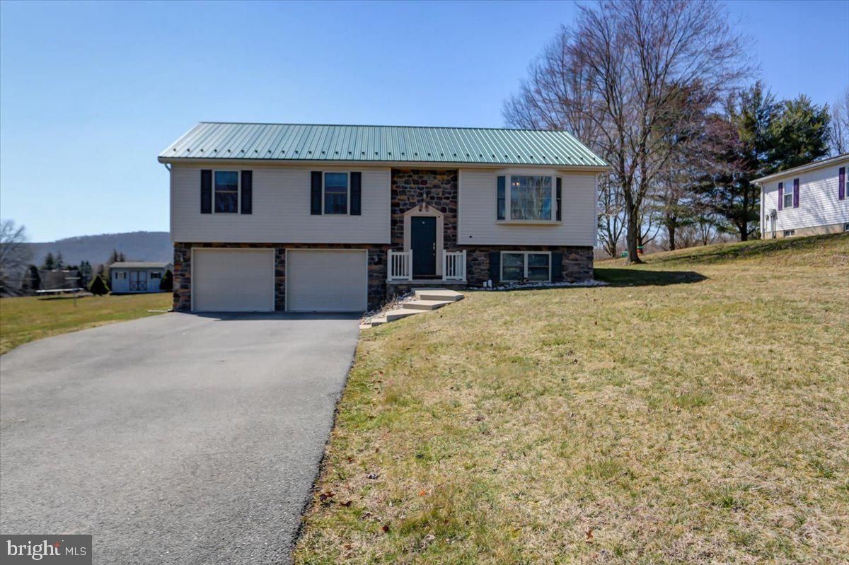 Welcome home! You don't want to miss this beautiful 3 bed 2 bath home in Greenwood School District, situated on .4+ Ac lot. Well maintained and pride of ownership is evident as you walk through the doors. This home is conveniently located, whether you are commuting to Selingsgrove, Lewistown or Harrisburg, etc. Some of the features that will be sure to be appreciated is the metal roof, the oversized 2-car garage and the storage shed.  Potential additional square footage can be added finishing the lower level, plumbing rough-in is present. The current homeowners have enjoyed gardening in the springtime and summer growing seasons while spending time outdoors in the quiet community.  Additionally, they will miss the nearby farm markets and local bakery.