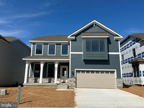Discover your dream home in the Summit Plan at Renn Quarter. this magnificent 3,947 sq ft quick move in, new construction home is meticulously designed for modern living. Located in an amenity-rich community just a mile from Downtown Frederick, this home seamlessly blends timeless elegance with contemporary comforts. Enjoy expansive living spaces, including a fully finished basement, a versatile loft, and a private tree lined backyard perfect for gatherings. The main level features an open-concept design with a desirable main-level bedroom and full bath. Prepare culinary delights in the designer kitchen, showcasing quartz countertops, stainless steel appliances, soft-close cabinetry, a large island, and a walk-in pantry – all included. Upgraded flooring and abundant natural light enhance the home's elegant finishes. The upstairs loft offers endless possibilities, while the luxurious primary suite provides a serene retreat with dual walk-in closets and a spa-inspired en-suite bath. The finished basement presents ample space for recreation, guests, a home gym, or a media room. Enjoy the convenience of a two-car garage with EV ready outlet, smart home features, and energy-efficient systems. community amenities, such as pools, dog parks, tot lots, and walking trails with planned Downtown Frederick access and commercial space further elevate the lifestyle. Move-in this July! Inquire about special builder incentives.
