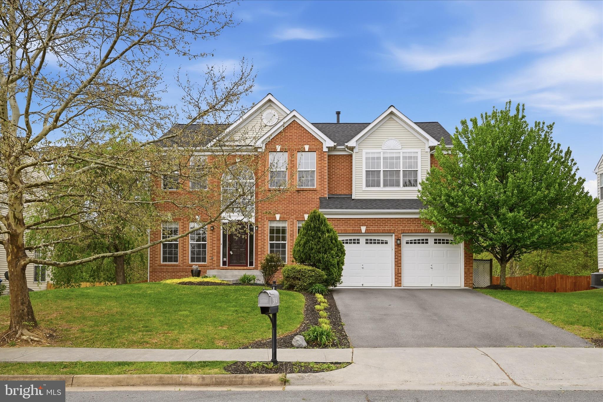 NEW PRICE!  Spacious and beautifully maintained 6-bedroom, 4-bath brick-front Colonial situated on a picturesque lot. Quality craftsmanship is evident from the moment you enter the impressive two-story foyer, flanked by formal living and dining rooms. The main level also features a generously sized home office—perfect for remote work—and an inviting family room with a stunning stone fireplace.

The gourmet kitchen is designed for both everyday living and entertaining, offering a large center island, table space, stainless steel appliances, pantry, and abundant cabinet and counter space. The breakfast area opens to a rear deck, ideal for grilling and hosting gatherings.

Upstairs, the open two-story overlook leads to a luxurious primary suite featuring a vaulted ceiling, a spacious sitting area, and an impressive custom walk-in closet designed for both style and function. Thoughtfully outfitted with built-in shelving and multiple hanging areas, the closet offers exceptional organization, while a cedar-accented wall adds a touch of warmth and natural elegance—ideal for preserving garments and adding rich character to the space. The spa-like ensuite bath offers a jetted tub, separate shower, and dual vanities.

Bedrooms two, three, and four are all generously sized and thoughtfully designed, each featuring large closets and abundant natural light. These versatile rooms offer plenty of space for family, guests, or a home office, with comfortable layouts that easily accommodate a variety of furniture arrangements. They share a well-appointed full hall bath, providing both convenience and functionality for everyday living.

The finished lower level is filled with natural light and offers a sixth bedroom, full bath, and a large recreation room complete with a custom wet bar. Walk out to the stamped concrete patio and enjoy the expansive, private backyard with raised garden beds, mature landscaping, beautiful perennials, and fruit trees—perfect for relaxing or entertaining outdoors.

Major updates include a brand-new roof and HVAC systems that are approximately 2 years old, offering peace of mind for years to come.