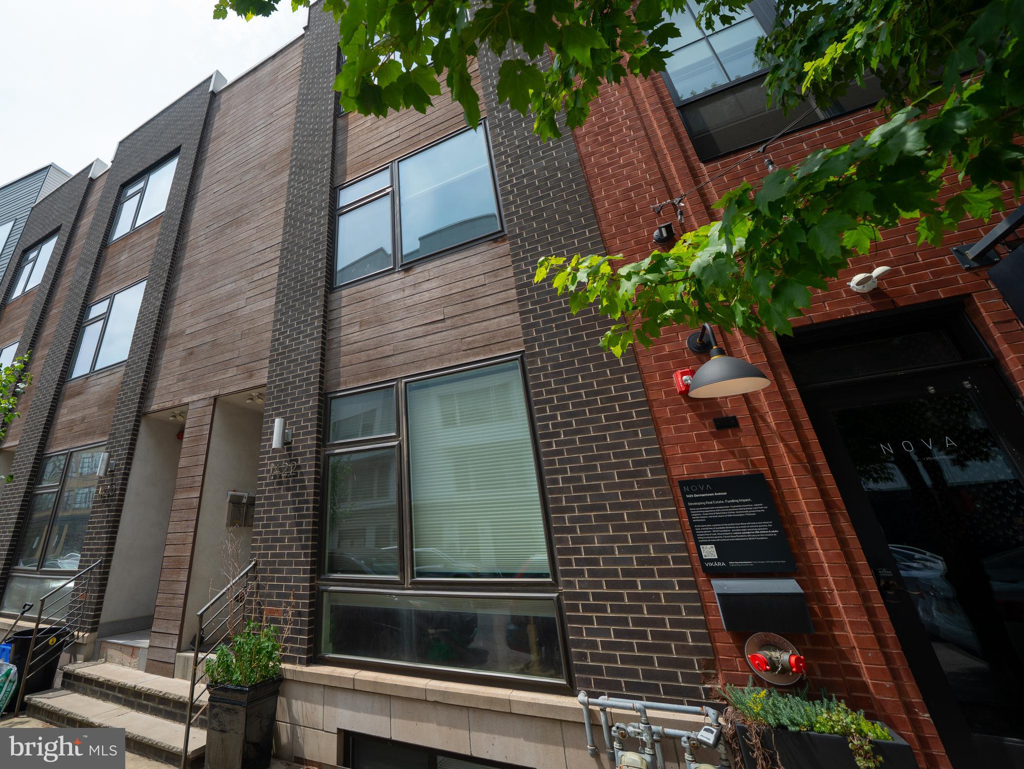 This Olde Kensington 3-bedroom, 3-full-bath bi-level condo is located on the top two floors and features a great open floor plan with its own private roof deck, complete with great views and storage. Come visit and experience a brighter option, with a lighter tone design exemplified by gleaming hardwoods and stunning white Corian countertops.
Enter the unit and head upstairs to the main living level, featuring an attractively appointed kitchen with a breakfast bar. The current owner uses the spacious first bedroom as a media room. A full bath is also located on this level.
Upstairs, you'll find the second bedroom with its own full bath, linen storage, and a sizable laundry room. The spacious primary suite feels grand, with clerestory windows that let in beautiful natural light. Dual vanities and additional storage were recently added to the primary bath for added convenience.
The home also includes a video doorbell system and an Ecobee thermostat with individual room sensors for efficiency.
With a Walk Score of 92 and close proximity to the Market-Frankford Line, plus everything Northern Liberties and Fishtown have to offer, this home is a gem.