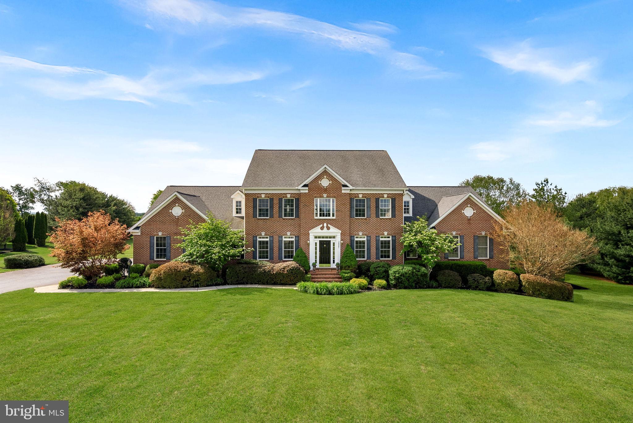 **OPEN HOUSE SAT 6/27 & SUN 6/28, 12-2PM** Don't miss this rare opportunity to live in Wright Farm, one of Western Loudoun's most desirable communities. Enjoy an exceptional neighborhood setting, just two minutes from the heart of Purcellville, where everyday conveniences and small town charm intersect.  

Thoughtfully designed for both elegant entertaining and comfortable everyday living, the home features a luxurious main-level primary suite, offering a private retreat with serene views and easy accessibility. A dedicated home office provides the ideal work-from-home space, supported by high-speed FIOS or Xfinity internet.

The heart of the home is anchored by a spectacular two-story family room featuring a cozy stone fireplace and soaring ceilings that create an impressive sense of space and light. Seamlessly connected to the family room is the expansive gourmet kitchen, thoughtfully designed for gathering and entertaining. A generous center island provides ample prep space and seating, while the spacious eat-in dining area offers the perfect place for casual meals, morning coffee, or hosting family and friends. Just off the kitchen, a large mudroom is both beautiful and functional, with a washer, dryer and featuring abundant upper and lower cabinetry, and storage to keep everyday life organized.

Natural light fills the home's inviting living spaces, including a beautiful enclosed sun porch where walls of windows frame picturesque views of the surrounding countryside and changing seasons.

Upstairs, four generously sized bedrooms and two full baths provide abundant space for family and guests. A second washer and dryer on the upper level adds exceptional convenience, making daily living effortless for busy households and overnight visitors alike.

The walk-out lower level is designed for entertaining, complete with a stylish wet bar featuring a refrigerator and dishwasher, creating the perfect setting for game days, celebrations, or relaxed evenings with friends. Two versatile bonus rooms offer endless possibilities for a home gym, media room, hobby space, guest accommodations, or additional office space. An expansive unfinished storage area provides abundant room for seasonal décor, recreational equipment, and long-term storage needs. 

From the lower level, step outside to a private patio that leads to the crown jewel of the property—a spectacular pool surrounded by lush landscaping and breathtaking countryside views. Additional enclosed storage is located under the porch with easy access for mowing and yard tools as well as pool equipment. Whether hosting summer gatherings, enjoying sunset swims, or unwinding beneath the stars, this outdoor oasis offers resort-style living right at home.

This home offers peace of mind with recent improvements, including a roof replacement and upgraded downspouts (2018), new carpet on the entire upper level and office (2026), an epoxy resurfaced patio (2025), cooktop (2026), refrigerator (2024) and newer heat pump, main level washer, dryer and dishwasher. Both zones of the HVAC systems are being replaced (June 2026).

Backing to open fields, enjoy breathtaking sunsets, peaceful pastoral views, and the rare privacy that comes from owning acreage in one of Loudoun County's most sought-after locations. Enjoy exceptional convenience with Route 7 just minutes away, downtown Purcellville's charming shops, restaurants, breweries, and wineries within easy reach, grocery stores and daily conveniences less than five minutes from home, access to Leesburg within 15 minutes and Dulles International Airport approximately 30 minutes away.

Rarely does a property offer this combination of luxury, privacy, acreage, breathtaking views, exceptional indoor and outdoor living spaces, and commuter-friendly convenience. This is more than a home—it's a lifestyle defined by space, sophistication, and the timeless beauty of Western Loudoun County.