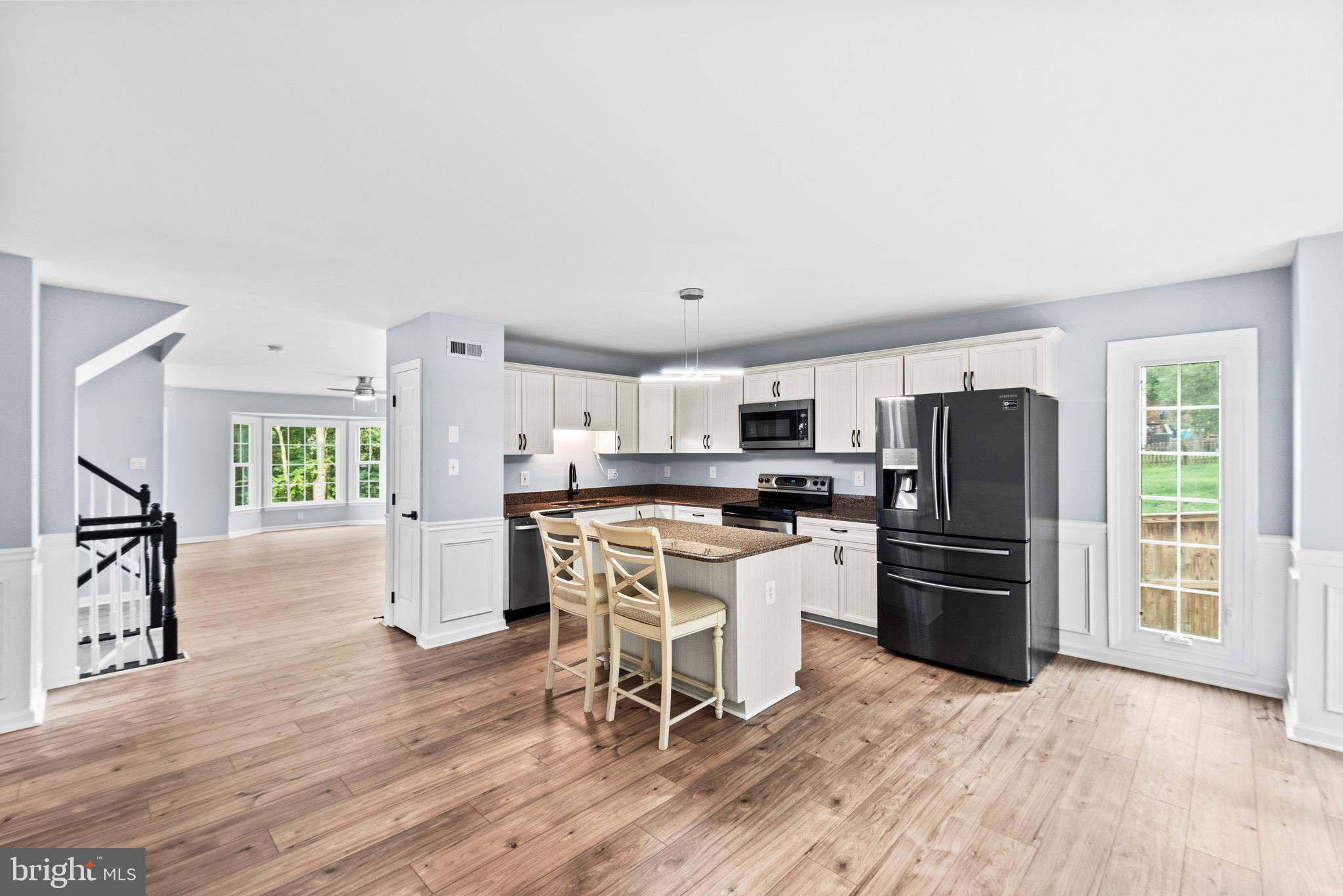 Welcome to 601 Twin Brook Ln, Stafford, VA—a beautifully updated end-unit townhouse offering approximately 2,550 square feet of stylish living space in a highly desirable community. This exceptional corner home combines modern upgrades, generous living areas, and enhanced privacy, making it the perfect place to call home.
Step inside to discover a bright, open floor plan featuring updated finishes throughout, creating a move-in-ready home that blends comfort with contemporary style. The spacious living and dining areas flow seamlessly into the updated kitchen, making it ideal for everyday living and entertaining alike.
Retreat to the spectacular primary suite, where you'll find a luxury spa-inspired master bathroom designed to impress. Featuring high-end finishes, elegant fixtures, and a sophisticated design, this stunning owner's bath offers the perfect place to relax and unwind after a long day.
Enjoy outdoor living in the fully fenced backyard, providing privacy for entertaining, pets, or simply enjoying your own outdoor oasis. The home also includes a one-car garage with additional driveway parking for added convenience.
As an end-unit, this home offers extra windows that fill the interior with natural light, along with the added privacy and spacious feel that only a corner location can provide.
Conveniently located just minutes from I-95, commuter lots, Quantico Marine Corps Base, shopping, restaurants, parks, and top-rated Stafford County schools, this home offers the perfect combination of luxury, location, and lifestyle.