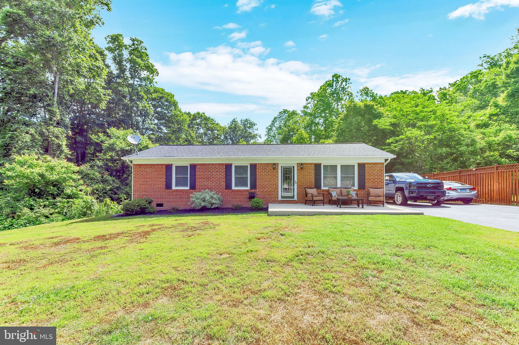 IMMACULATE! 3 Bed 2 Bath Rambler in Mechanicsville! This home  gives you the best in location and privacy! Walking in, you take notice of the beautiful flooring that runs throughout the home! The family room is spacious and has an opening into the kitchen giving the feel of an open floorplan with additional functionality! The kitchen has eye-catching finishes, with the subway tile backsplash, the upgraded white countertops and stainless steel appliances! There is room for a kitchen table and built in cabinents on opposing wall for extra storage! The back deck leads right off the kitchen which gives you the option for outdoor dining. Down the hall you will find the full sized bathroom that services the two nicely sized additional bedrooms! There is also a designated laundry room with ample room! The master bedroom is a decent size and has a nicely updated master bathroom! Almost everything major is new! This home was well-cared for and it shows in the details!