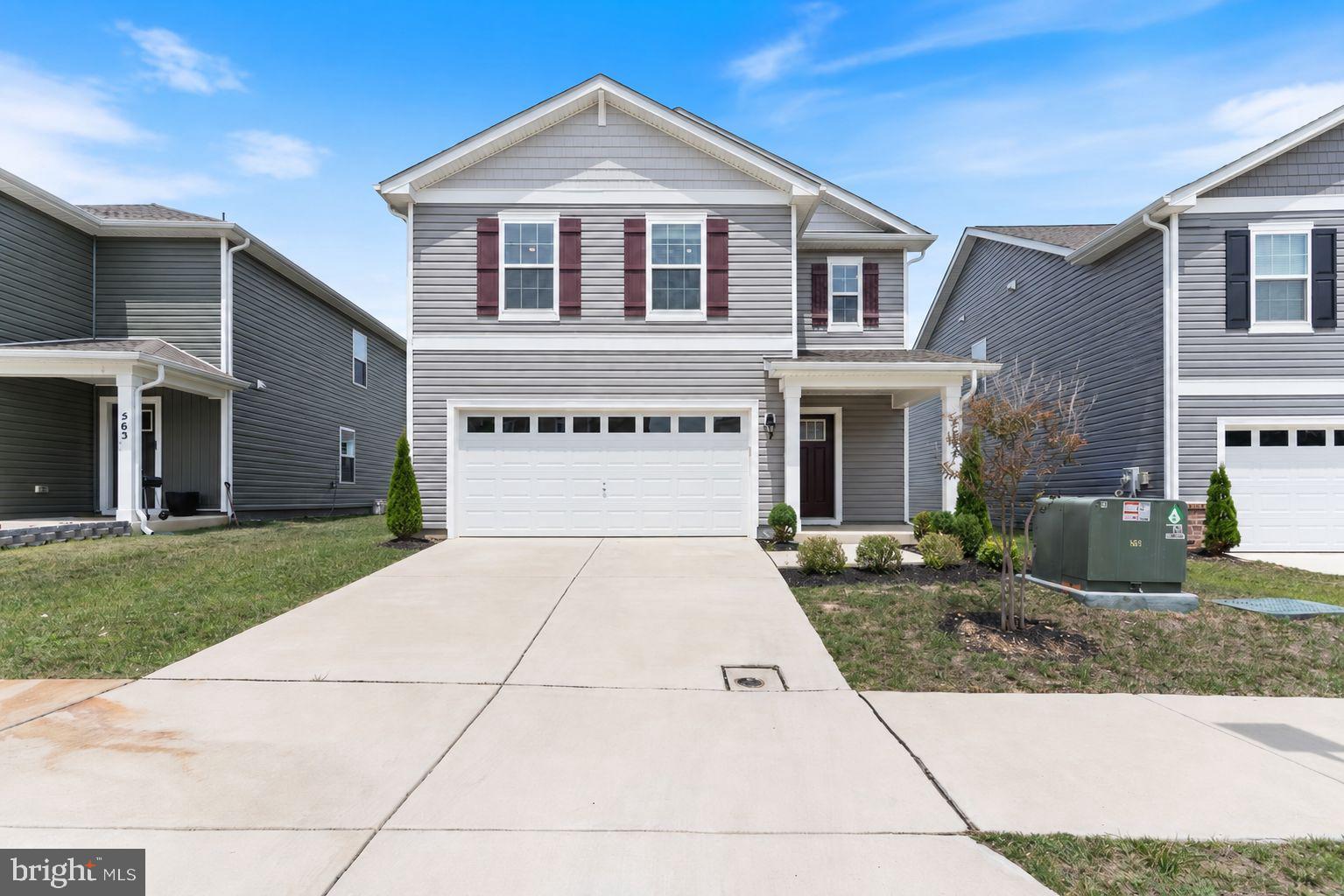 Skip the wait and enjoy the benefits of a home that's ready from day one. Built in 2023 and meticulously maintained, this popular Cabral model offers modern finishes, a functional layout, and the confidence of owning a nearly new home that has already been thoughtfully cared for. Located in the desirable Pine Grove community of La Plata, residents enjoy walking and jogging trails, a pet-friendly neighborhood, and a community pool coming soon, all while being just minutes from shopping, dining, schools, parks, and the charm of downtown La Plata. Designed for today's lifestyle, the open-concept main level offers comfortable spaces for gathering and entertaining. The spacious living room flows effortlessly into the beautifully appointed kitchen featuring stainless steel appliances, stylish cabinetry, abundant counter space, a generous center island with seating, a corner pantry, and plenty of natural light. Sliding glass doors provide easy access to the backyard for grilling, relaxing, or enjoying time outdoors. Upstairs, the spacious primary suite offers a large walk-in closet and a private bath with an oversized walk-in shower. Two additional bedrooms, a full hall bath, and a conveniently located laundry room complete the upper level, while the versatile loft provides the flexibility for a home office, reading nook, playroom, media room, or additional living space. A two-car garage and private driveway provide everyday convenience, while the home's exceptional condition allows you to move in and immediately begin enjoying everything it has to offer. Combining one of Pine Grove's most sought-after floor plans with modern construction, low-maintenance living, and an outstanding location, this home presents an exceptional opportunity to enjoy all the advantages of newer construction without the delays of building from the ground up.