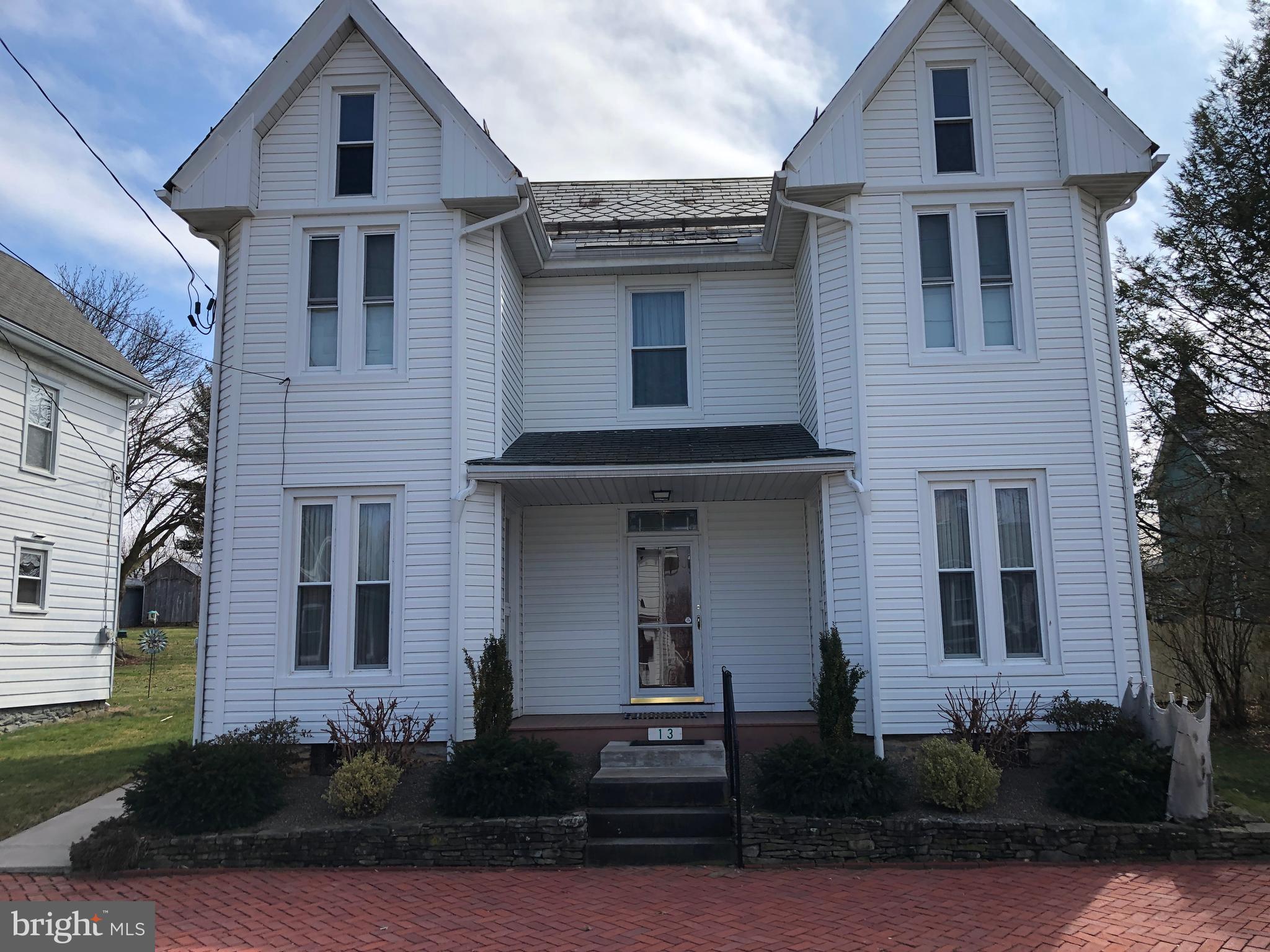 Enjoy life in the Western Maryland town of Smithsburg, with all the charm and small town feel, yet close to Hagerstown and  Washington County Md. This home is also  located close to Pennsylvania and West Virgina. Easy access to I-70 and I-81 makes convenient travel to Washington and Baltimore and airports and more.  Lovely piece of Smithsburg history. 
Built in 1909.  This home is well preserved and updated in functionality. This home offers so much . The original slate roof is well maintained. Vinyl siding and Geo-thermal heating are just 2 examples of improved functionality. Three bedrooms and bath on the second floor and  the first floor boasts a country kitchen and separate dining room, living room and another room could be a family room or first floor bedroom. Laundry room , small office and bathroom with a shower provide flexible  use of the first floor.
Behind the house you will find a covered porch/patio and well maintained back yard. The space is well used with a two car garage/barn for a shop or parking. Off street parking as well.
This house is ready for you to add your touches to become home.