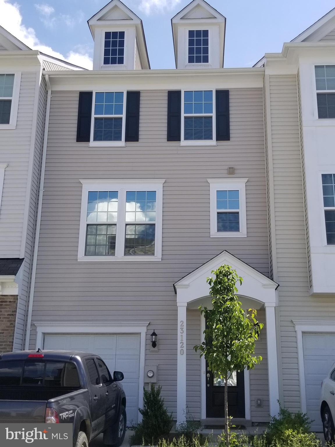 Very well appointed unit.  Features double oven and state of the art kitchen. Alarm system in place for added security.  First level room may be used as bedroom or office / rec area.  Community playground nearby.  HOA includes Wildewood pool!! Garage for vehicle / storage.