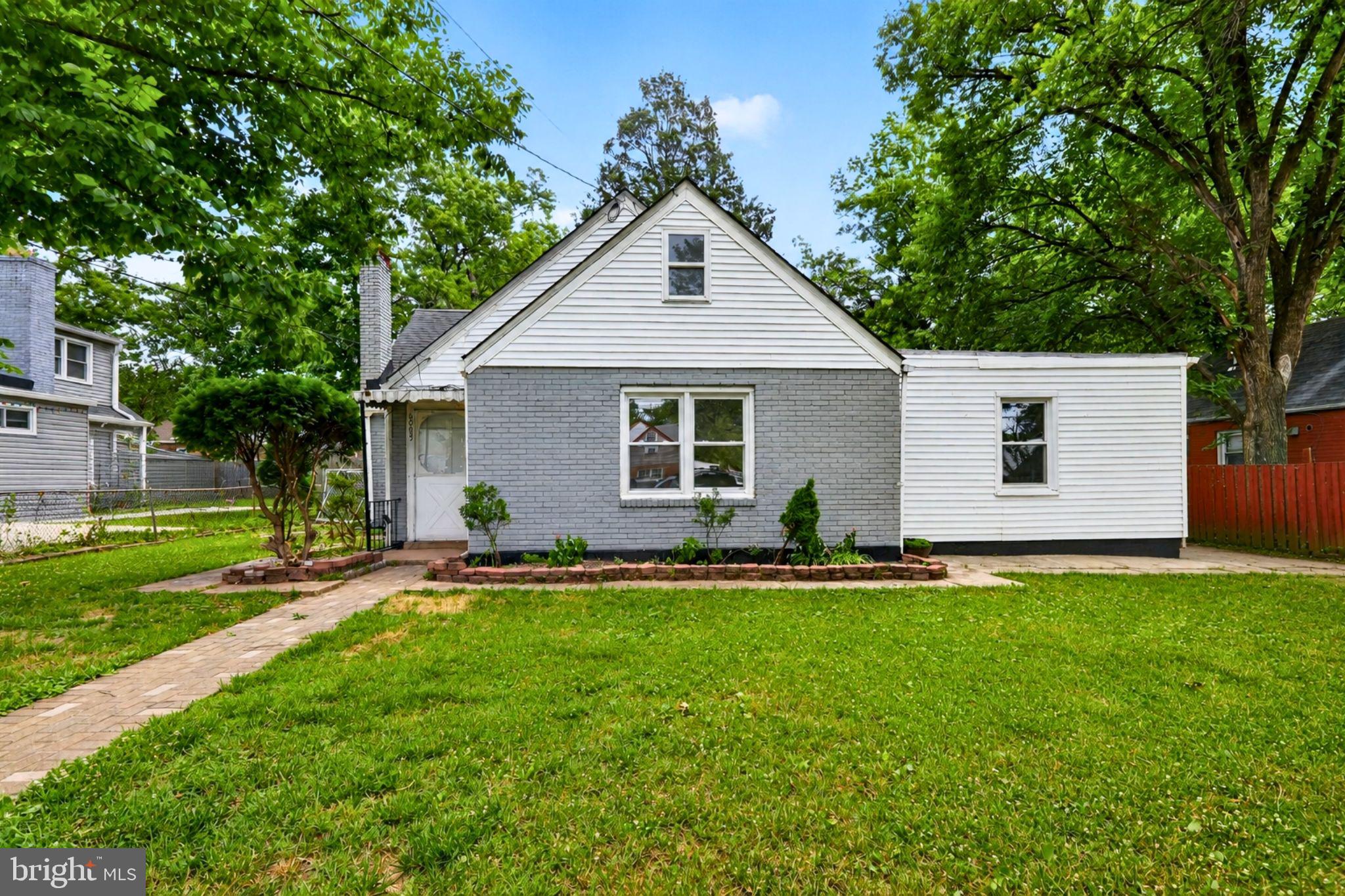 Priced for opportunity with 5 bedrooms, a fenced yard, and room to add your personal style. 
If you've been searching for extra space at a great price, this 5-bedroom, 2.5-bath home deserves a closer look. Already comfortable and functional as-is, it offers the chance to move in now while making updates over time to match your vision.
The inside has a practical layout with generously sized bedrooms, giving everyone space to spread out for sleeping, working, studying, or hosting. The kitchen is ready, offering the functionality you need today with the potential to design something even more special in the future.
Outside, both the front and backyard give you space to enjoy life outdoors. The fenced yard is ideal for pets, gardening, play equipment, weekend cookouts, or simply relaxing under the shade of mature trees. 
The location adds even more value. You'll be minutes from Landover Metro Station, John Hanson Highway (Route 50), Landover Road, and major commuter routes connecting you to Washington, D.C., Annapolis, and surrounding Prince George's County destinations. Nearby shopping, restaurants, grocery stores, schools, and everyday conveniences help keep errands and commuting simple.
With its multiple bedrooms, flexible living spaces, and a fenced yard, this property offers great value for buyers looking to personalize their home.