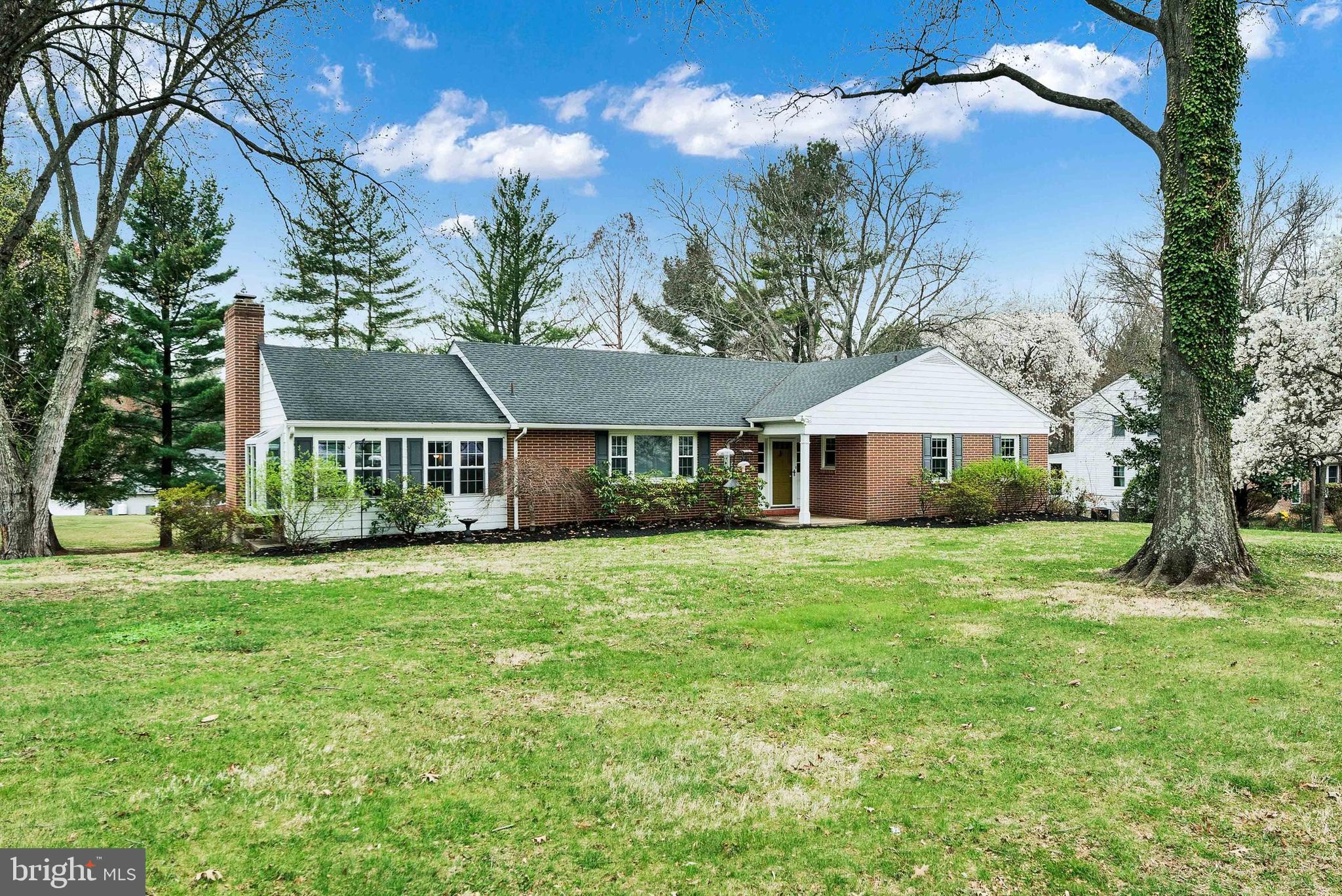 Impeccably maintained rancher in West Chester Borough's Roslyn neighborhood and in West Chester School District.  Located approx. 1 mile to downtown.  Incredible in-law suite on the bright lower level with an additional approx. 1000 sq ft boasts a full new bath, full kitchen, large family room area and a private entrance.  The garage measures 672 s/f  and the new garage doors measure 8 'x 8' which allow for a pick up truck. 
The home sits on almost 3/4 of an acre with a deep lot allowing for maximum backyard privacy.  The home's exterior is maintenance free with Hardie Board siding and brick and boasts a new roof, new windows, gutters, soffits, very large new deck with new patio doors, and brand new driveway with extra large parking area.  Security lighting around the perimeter.   Hardwood floors on main level, new carpets being installed 4/18 in upstairs level.  
Just pack your bags and move into this West Chester gem.  It truly is move in ready!