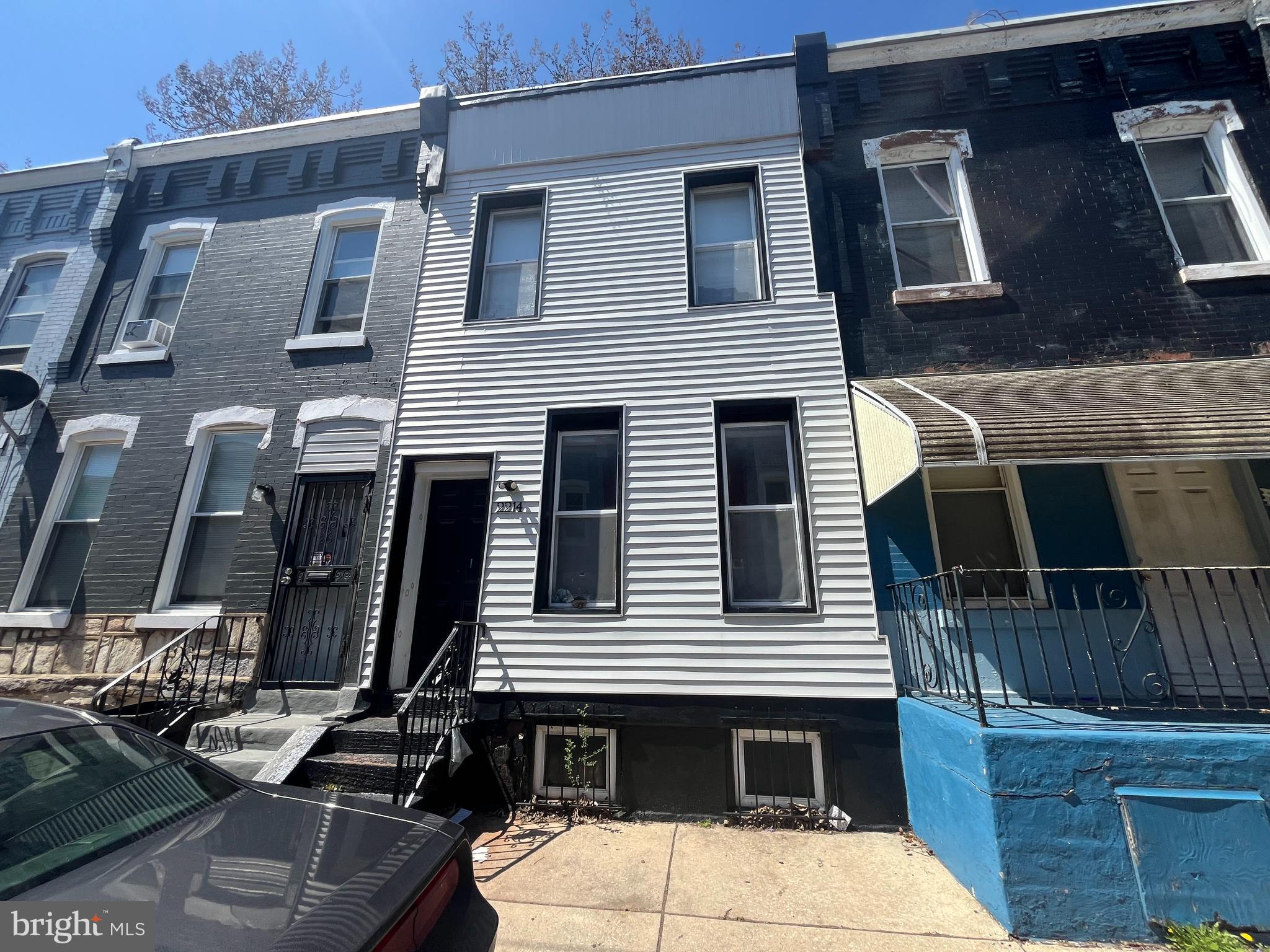 Welcome to this charming brick rowhouse located in the Glenwood neighborhood of North Philadelphia. Built in 1915, this home offers approximately 958 square feet of interior living space. The main level features a spacious living room, formal dining room, convenient half bath, and a kitchen with direct walk-out access to the rear yard—ideal for outdoor enjoyment or future customization.

The upper level includes three well-proportioned bedrooms and a full bathroom. Additional highlights include a partially finished basement, offering potential for storage or future finishing, and ample on-street parking. The property is conveniently located near local shopping, public transportation, and provides easy access to major roadways, making commuting straightforward.