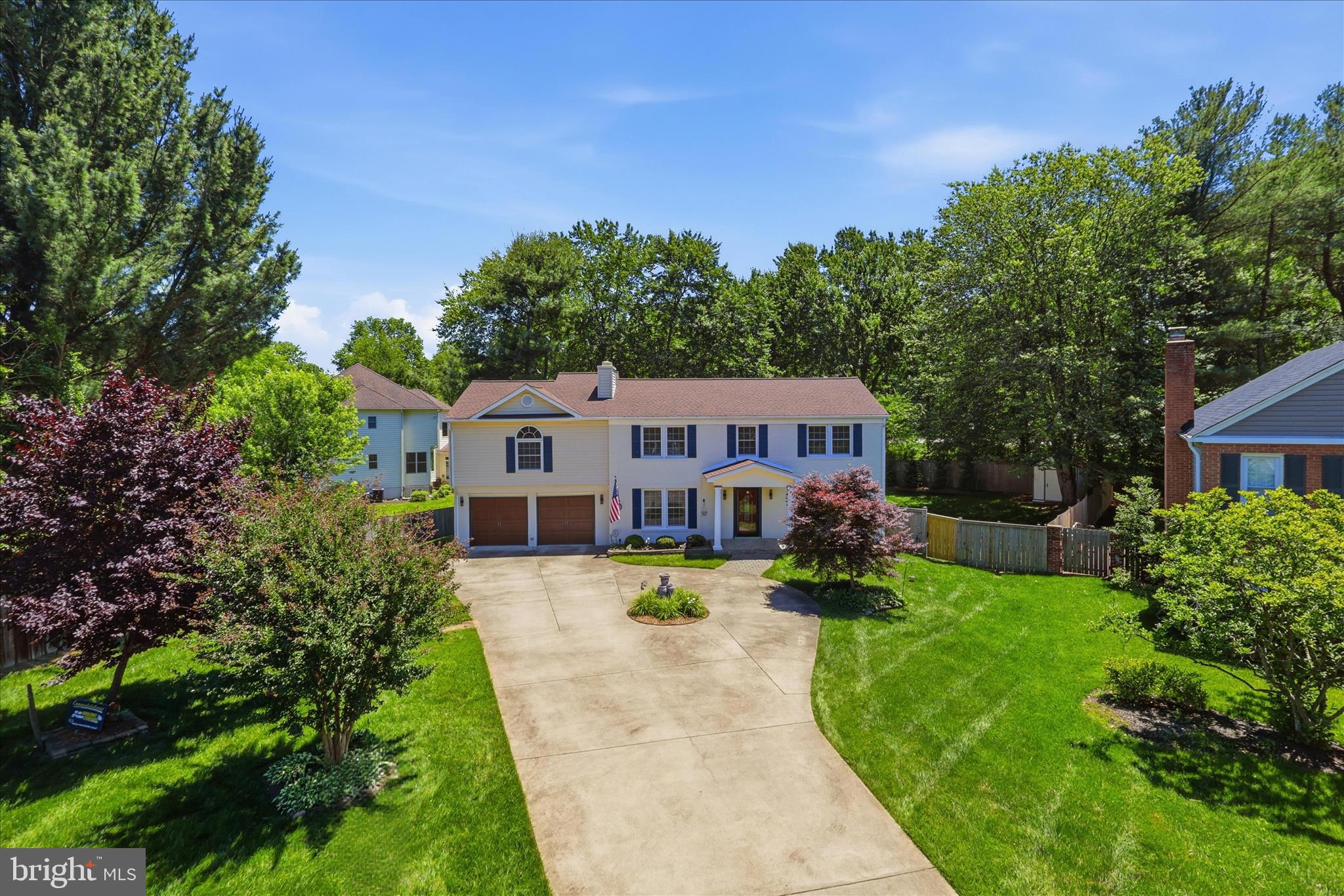 Welcome to 4003 Kloman Street, nestled in the prestigious Woodbine Estates community. This exquisite two-level colonial home offers a harmonious blend of elegance and comfort, perfect for those seeking a luxurious lifestyle, and those with multi-generational family needs. There is an in-law suite with a separate staircase off of the great room, in which it could be used as an office or a secondary family room.   The property is zoned top-rated schools in the county, with Woodson High School, Frost Middle School and Mantua Elementary School.  The new owners will be eligible to join the highly sought after Mantua Swim and Tennis Club in the neighborhood.  Enjoy wide and beautifully maintained sidewalks right outside the front door!  Perfect for taking the kids to school, morning walks, or enjoying the evening stroll through this highly walkable neighborhood.   Additionally, the home is located minutes away from I-495, Routes 50 and 236, Old Town Fairfax, George Mason University, INOVA Fairfax Hospital, and the Mosaic District with many options for fine dining and shopping. Enjoy nearby Winterset Varsity Park, Eakin Park and Accotink Trail as part of the outdoor activities.  The commute to DC and the Pentagon, via I-495 and I-395 is a breeze.
Many upgrades have been completed in this beautiful home from 2016 to 2025, including but not limited to washer and dryer replacement (2016), primary bathroom renovation(2018), dual HVAC system replacement (2018), entire roof replacement (2019), exterior fence replacement (2019 and 2025), GE Stainless Steel kitchen appliance upgrade and Whirlpool range hood installation(2025), all window treatment replacement(2025), hardwood floor installation in four bedrooms (2025), and all light fixture replacement (2025). Please refer to all upgrades in the attached documents.  Spanning over 3,100 square feet, this residence boasts six spacious bedrooms, oversized great room opening to the deck and private backyard, and three and a half beautifully appointed bathrooms, ensuring ample space for relaxation and entertainment. Step inside to discover an inviting open floor plan that seamlessly connects the living, dining, and kitchen areas. The heart of the home features an eat-in kitchen equipped with stainless steel appliances, making meal preparation a delight. The rich wood floors throughout add warmth and sophistication, while the dining area is perfect for hosting intimate gatherings or festive celebrations. Large windows allow natural light to flood the space, enhancing the home's inviting ambiance. Each bedroom is generously sized, with the master suite featuring a luxurious walk-in closet and an updated en-suite bathroom providing a private retreat for relaxation. The exterior features a spacious deck, and a beautifully landscaped yard with play set (installed in 2017), perfect for outdoor enjoyment. This home also includes modern conveniences such as a two-car attached garage and a circular driveway for additional easy parking. Security features, including smoke detectors and a pre- wired alarm system, provide peace of mind. Experience the exclusive lifestyle that Woodbine Estates has to offer, where luxury meets comfort in every corner of this stunning home.  No HOA fees are associated with this property with only a minimal optional annual fee for block parties and events. 
With its excellent condition, high-end finishes and nearby amenities, this property is not just a house; it's a place to create lasting memories.