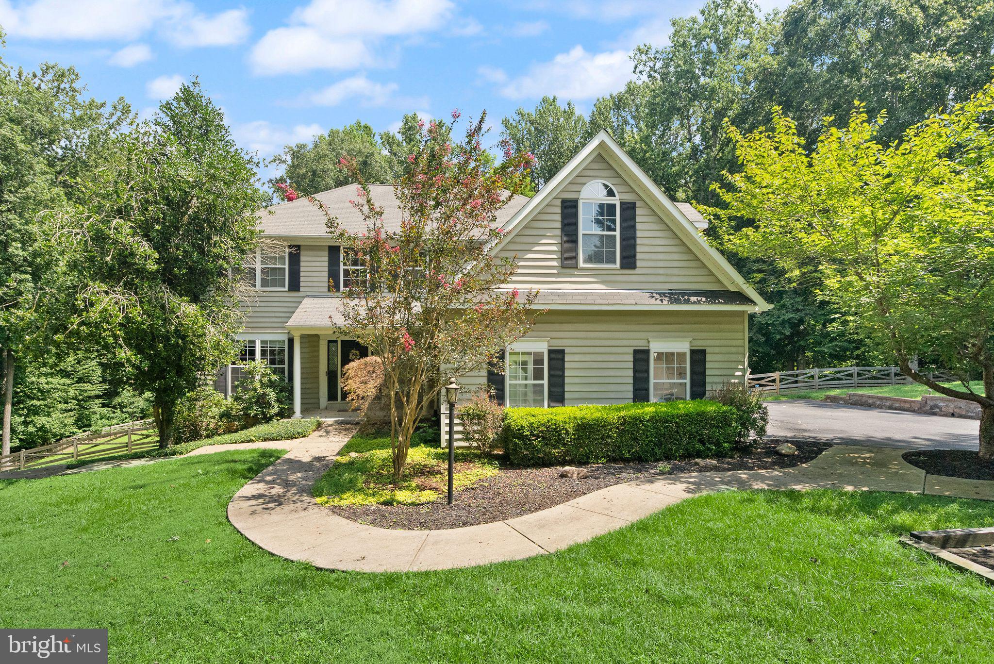 Welcome to Your Dream Home at 6734 Newcastle Ct, Port Tobacco, MD! Tucked away in a private and peaceful neighborhood, this updated 5-bedroom, 4.5-bathroom home offers over 4,200 square feet of living space on a 4.5 acre lot. As you enter, you’ll be greeted by a two-story foyer, with gleaming hardwood floors and high-end finishes throughout. The formal living area to your left flows into the formal dining area and around to the kitchen which easily guides into the eat-in kitchen and inviting family room. 

The heart of this home is its stunning kitchen, featuring custom cabinetry, stone countertops, & stainless steel appliances. A large center island offers plenty of workspace, while the breakfast nook, bathed in natural light, overlooks the private backyard and the family room. With access from the breakfast nook and family room to the back deck this is the perfect space for entertaining! Off the family room is a spare room that also features access to the backyard and deck, perfect for an office or playroom. Additionally off the family room is another spare room up a flight of stairs for privacy, with enough space for a bedroom, office, or crafting space (FROG). 

On the top floor, you'll find the expansive master suite with enough space for a king bed and sitting area, and features access to a private balcony. The luxurious en-suite bath boasts a walk-in closet and spa-like soaking tub, dual vanities, and a separate shower. Three additional bedrooms and one set of washer & dryers, along with another full bathroom are also on this level. 

The fully finished basement would be perfect for an in-law space, rental opportunity, or recreational area. Featuring two rooms and a full-kitchen and living area that has a private exit to the backyard. There is a second washer & dryer as well. This flexible space can easily accommodate a variety of needs, whether for guests, a home gym, or a playroom.

This home is gorgeous on its own, but the massive lot creates a private oasis with over 4.5 acres of gorgeous land. Additional features include a 2-car garage with multiple spaces for other cars in the driveway and recent updates, including newer HVAC systems and water heater.

Located just minutes from Route 301, you’ll have easy access to shopping, dining, and recreational opportunities, including the nearby Port Tobacco River for kayaking and nature walks. This is more than just a home – it’s a lifestyle. Don’t miss your chance to own this exceptional property at 6734 Newcastle Ct. Schedule your private tour today! Ask about VA Assumable Loan!