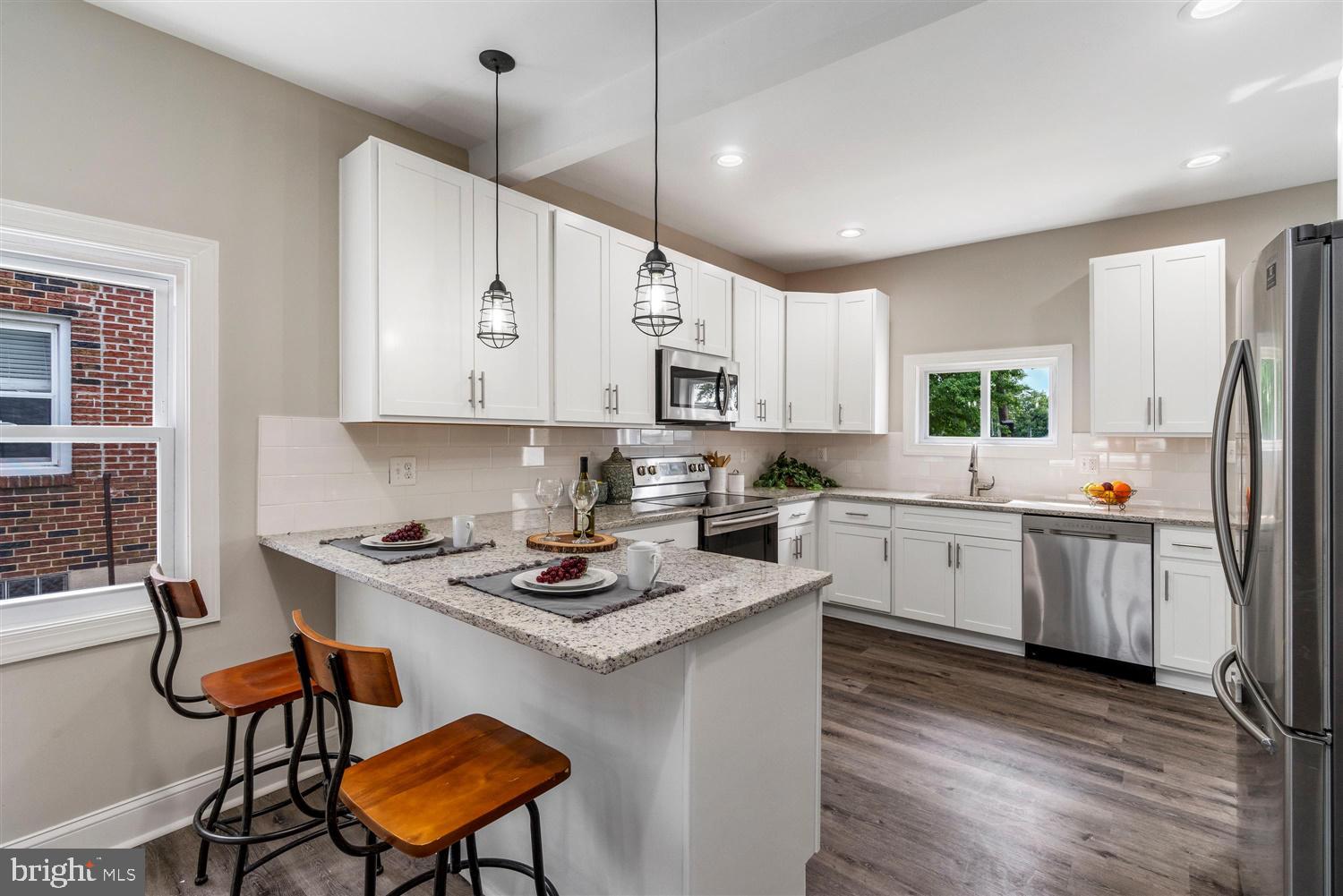 Welcome Home With WaterViews !!! Stunning Open Floor Plan 3 Bedrooms, 2 Bath With Finished Basement.Open Floor Plans Offers Hardwood Floors, Tons Of Natural Light, Kitchen Has Granite, Breakfast Bar, Stainless Steel Appliances, Deck Off Rear. Tile Baths, Fully Finished Lower Level. A True Must See