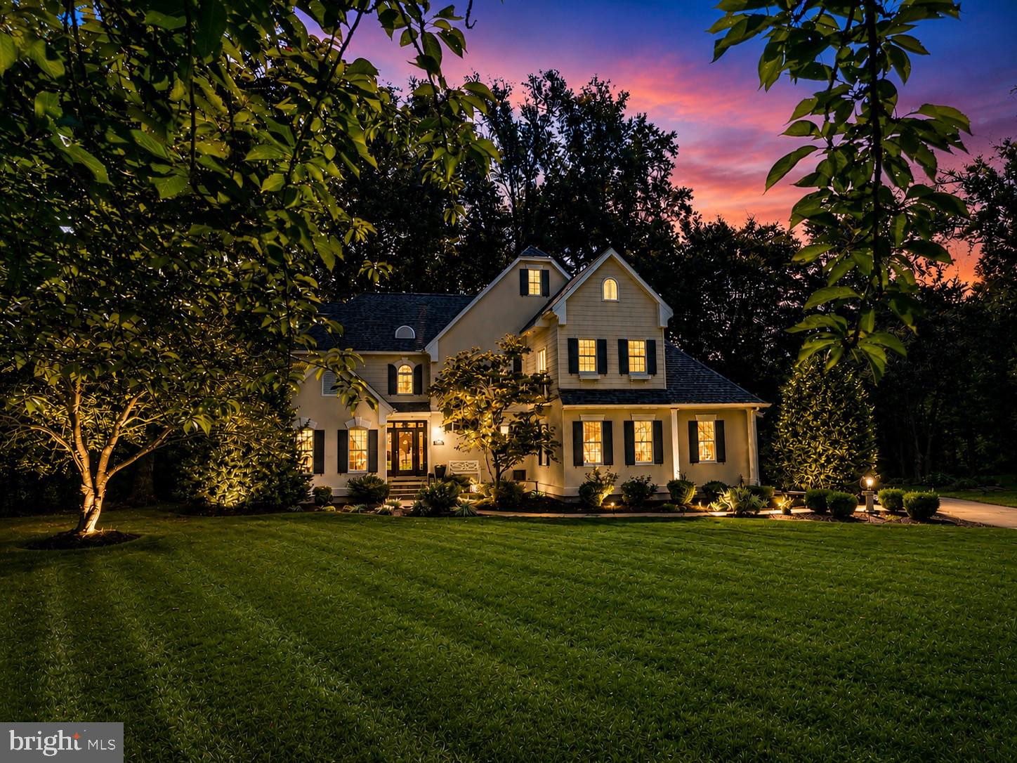 Where Everyday Living Feels Like a Country Club Retreat—Designed for the way you live, work, and entertain, this custom-built residence by Wilbur Smith offers exceptional flexibility for executive entertaining, multi-generational living, remote work, or simply enjoying a private retreat tucked discreetly within Dover. The thoughtfully designed floor plan can easily accommodate an in-law suite on either the main or upper level, while the fully finished walkout basement provides additional space for recreation, fitness, hobbies, guests, or extended living.

Nestled at the end of a cul-de-sac and backing to mature trees and abundant wildlife, this remarkable home is located within an intimate hidden professional  community of 18 homes—where opportunities to own are rare.

Inside, quality craftsmanship and attention to detail are evident throughout. The welcoming foyer opens to an elegant formal dining room featuring hardwood floors, a soaring cathedral ceiling, and a dramatic floor-to-ceiling bay window—perfect for holiday gatherings and special occasions.

The gourmet kitchen is equally suited for everyday living and effortless entertaining, offering a center island with cooktop and downdraft, custom cabinetry, double sink, built-in desk, and separate serving station with bar sink. The sun-filled breakfast nook overlooks the private wooded backyard and outdoor living spaces.

At the heart of the home, the dramatic two-story living room showcases a soaring ceiling, dual-sided fireplace, custom built-ins, and integrated audio throughout the main level and patio. Its open design creates an inviting setting for both intimate evenings and larger gatherings.

A stylish powder room and oversized laundry room with granite countertops, built-ins, front-load washer and dryer, and concealed ironing station add everyday convenience.

The luxurious primary suite serves as a true private retreat, highlighted by a stunning floor-to-ceiling fireplace, spacious sitting area, spa-inspired bath with heated floors, oversized walk-in shower, private water closet, and expansive walk-in closet.

Upstairs, a graceful bridge overlooks the living room below and leads to a private guest suite with its own bath and walk-in closet. A spacious home office supports today's work-from-home lifestyle, while the oversized bonus room offers endless possibilities as a media room, playroom, studio, additional bedroom, or part of a second-floor in-law suite. Additional bedrooms feature custom millwork, decorative moldings, reading nooks and charming architectural details.

The finished walkout basement further enhances the home's versatility, providing flexible space for fitness, recreation, hobbies, guests, or multi-generational living.

Outside, the private patio veranda is designed for memorable gatherings and relaxed outdoor living. Complete with extensive hardscaping, a built-in grill, generous entertaining areas, and a tranquil wooded backdrop, it is the perfect setting for summer cookouts, evening cocktails, family celebrations, or peaceful mornings surrounded by nature.

Offering privacy, flexibility, and exceptional entertaining spaces, this distinctive residence delivers a lifestyle rarely found in Dover.