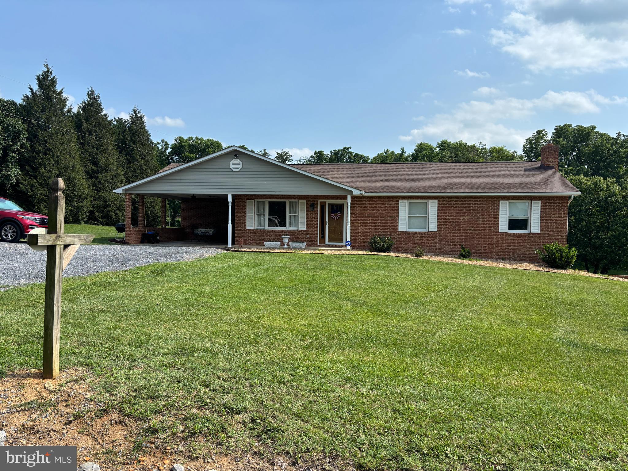 Welcome Home! Well maintained one owner brick home on 1.47 rural acres. 3 bedrooms/2.5 baths on the main level. Carport, spacious deck & side patio. Family Room in basement with gas log stove. Full bathroom off the Family Room.  Large storage/utility room adjacent to Family Room. Updated Master bath. A-1 (agriculture) zoning, no restrictions on pets.

More pictures to come!