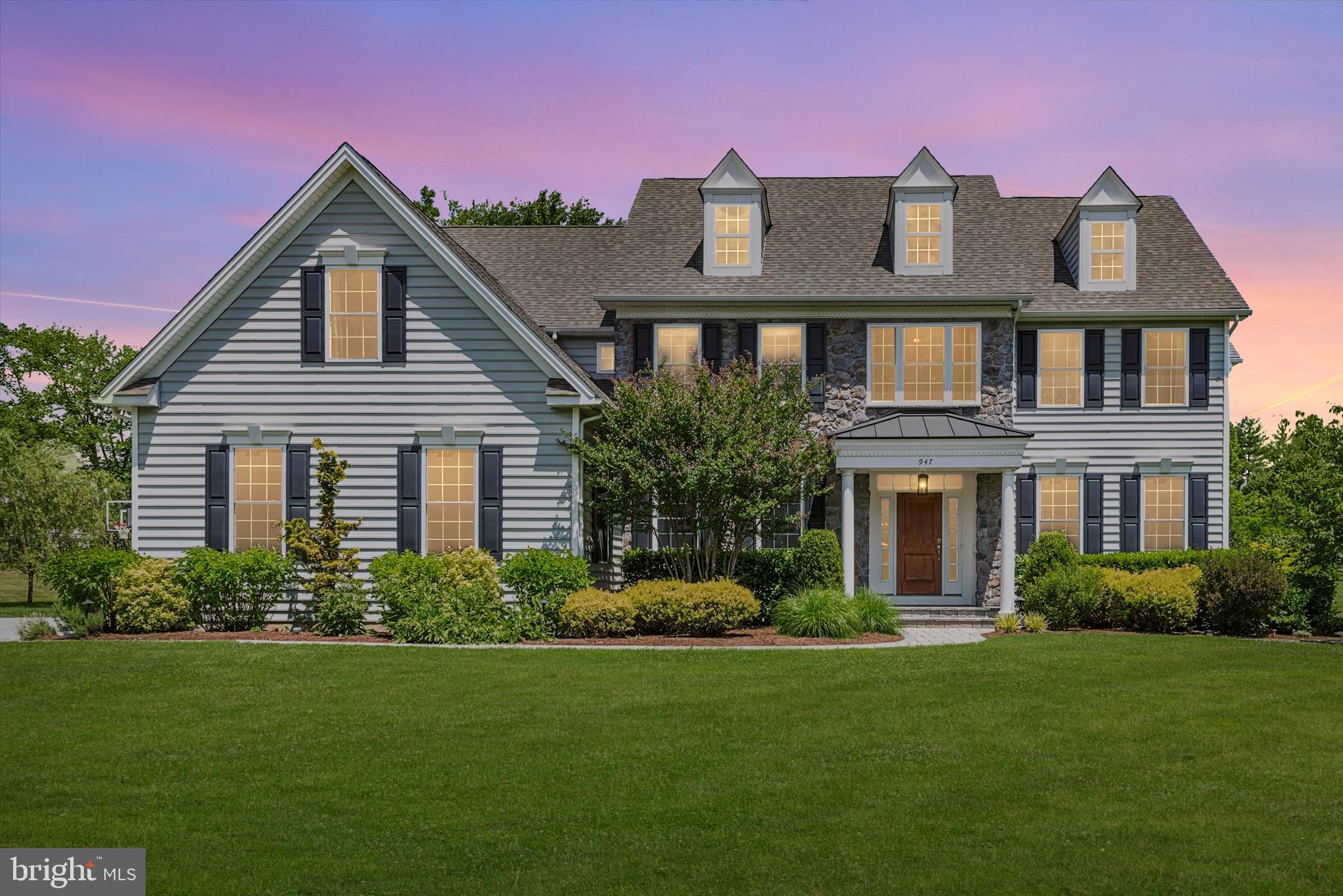 Welcome to 947 Cornwallis Drive, West Chester, PA, a meticulously designed home where every detail has been crafted with elegance and functionality in mind.  This exceptional property boasts a wealth of features that combine luxury with practicality.  This East Goshen home is carefully situated on approximately 2.3 acres just around the corner from East Goshen Park and Applebrook Golf Club. 

As you enter the garage side, you are greeted by a thoughtfully designed mudroom featuring a custom black walnut bench with shelving, perfect for storage and organization.  Tailored under stair storage with a discreet door adds to the seamless blend of style and convenience.  Even a lower set of hooks was perfectly placed for your little ones or pets!  Tile floors lead you to a back staircase, ensuring easy access throughout the home.  
The first floor offers versatility with an office that opens to the rear yard, ideal for work-from-home convenience, and a spacious living room that can easily transform into a playroom or additional office space as needed, all adorned with beautiful hardwood floors.
The heart of the home, the kitchen, is a chef's dream with upgraded hardware throughout, a kitchen island crafted with reclaimed oak and offering seating for up to 6.  High end SS appliances including a Bosch double oven, GE fridge, and a Thermador range with hood.  Soft close drawers, subway tile backsplash, and tall cabinets provide great storage, while a corner, walk in pantry ensures everything has a place. 
Adjacent to the kitchen, the breakfast room/nook features a custom vaulted ceiling creating a cozy atmosphere for casual dining.  The den is a warm retreat with a wood burning FP accented by a mantle and FP surround with reclaimed wood from an Amish barn beam, complemented by custom shiplap walls.  Vaulted ceilings make this an impressive room.
The Dining Room impresses with chair rails, perfect for formal gatherings.
Bathrooms throughout showcase reclaimed cedar highlight walls and plantation shutters adding character and privacy.
Upstairs, hardwood floors continue into the hall where wainscoting adds a touch of classic charm.  The rear stairs feature wood treads complemented by bespoke backing and custom board and batten detailing, extending into the upstairs hallway for a cohesive look.
Bedrooms are designed with comfort in mind, featuring unique custom wood walls and ELFA closets.  The owner's suite is a sanctuary with a tray ceiling, sitting area, and a luxurious ensuite bathroom boasting large sink/vanity tops, a water closet, and a soaking tub center stage.  
Finishing off the top floor is a large sun lit laundry room inclusive of sink, folding area, nooks for laundry baskets, cabinets and folding area.
Utility features include a self cleaning water filtration system, water softener, and geothermal system for energy efficiency, keeping your bills lower.
As an added bonus to the 3 car attached garage, there is a separate 2 car detached garage with bonus storage in the loft, and electricity.   Raised garden beds and a fantastic yard make this outdoors a great place to gather.  A lanai like covered patio with ceiling fan, recessed lighting and phantom screens make this backyard an oasis.  If you prefer to star gaze, just beyond the lanai is the perfect place for your Adirondack chairs to gaze up or enjoy the warmth of a custom outdoor stone fireplace.  There are so many things to love about this custom home that include a neighborhood yet space between homes, a large private yard yet close to so many things, this home is the perfect marriage of "having it all".