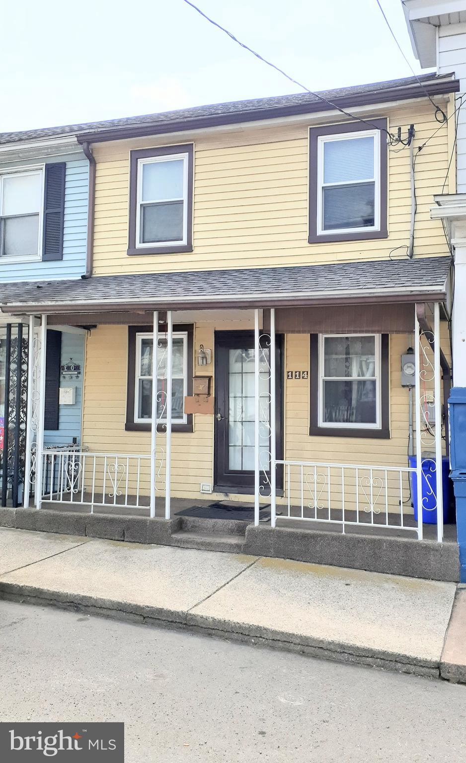 Interior row in downtown St Clair with concrete front porch.  First floor has a good size living room and a full bath and kitchen.  Second floor consists of a front bedroom with generous closet space and another full bath.
There is another small room which could be a computer room or office .  The roof is approximately          6     years old and the windows are vinyl replacement also done at same time roof was replaced.   200 amp electrical service also updated at that time .  Laundry space is in the kitchen.