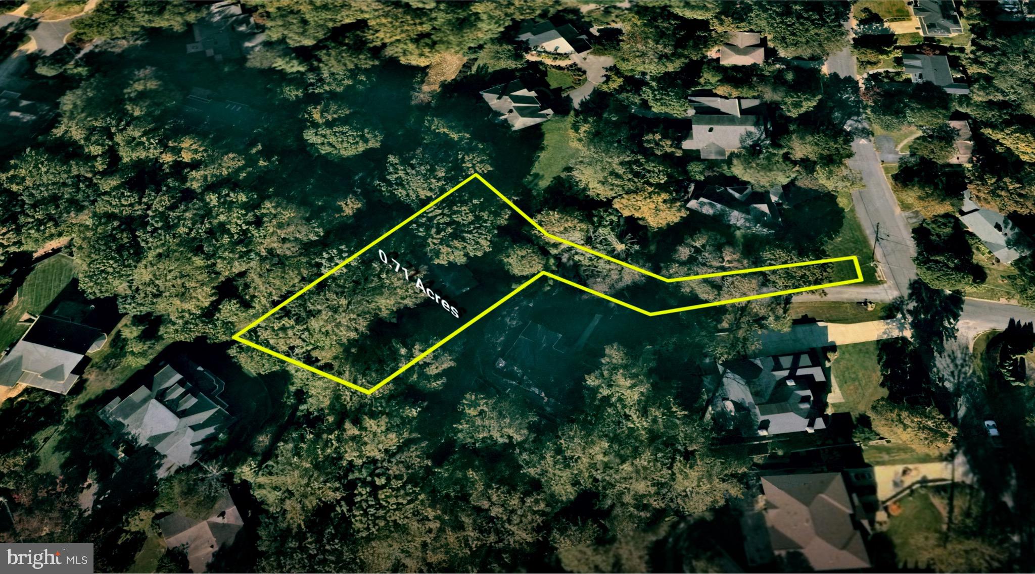 Nestled away from the street, down a private, wooded drive in Bethesda's esteemed Bannockburn Estates, lies a unique 0.71-acre lot. This buildable parcel offers unparalleled privacy, presenting a rare chance to create a spectacular custom home in a neighborhood where demand is a perennial driving force. With easy access to River Road, Clara Barton Parkway, and the Beltway, the lot is already connected to public utilities and belongs to the highly rated Whitman school cluster. A rare and in demand opportunity in one of the Capital Region's most coveted locations.