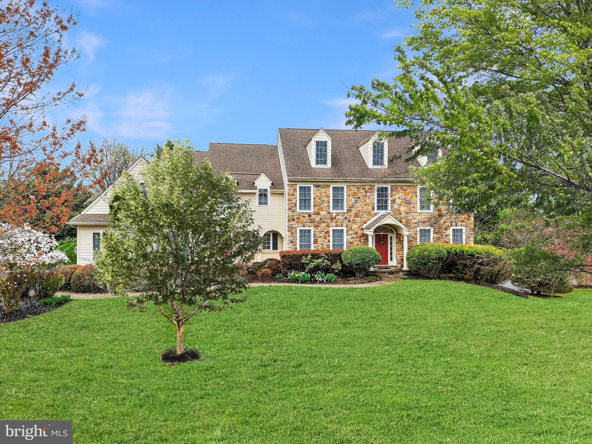Quality Construction in Unionville -Chaddsford Schools .  Welcome to a stunning home in the highly sought-after Olmsted community. From the moment you step inside, you’re greeted by a grand two-story foyer and extensive, gleaming site-finished hardwood floors that flow seamlessly throughout the main level—setting the tone for the elegance that unfolds. The formal living room with a gas fireplace and the gracious dining room create the perfect setting for refined entertaining. At the heart of the home, a gourmet white island kitchen with breakfast area opens effortlessly to a light-filled sunroom and an expansive family room anchored by a dramatic fieldstone fireplace—an ideal space for both everyday living and memorable gatherings.  A private first-floor office with custom built-ins offers the perfect work-from-home retreat, while a walk-in pantry, powder room, and laundry room complete the main level with both style and functionality. Upstairs, retreat to the luxurious primary suite, featuring a tray ceiling, inviting sitting room, two walk-in closets, and a spacious spa-like bath. A well-appointed en-suite bedroom creates a perfect princess/prince suite, while two additional bedrooms share a hall bath. A fifth bedroom with an oversized sitting area or playroom offers incredible flexibility for today’s lifestyle.  Plenty of storage space or future expansion is available in the walk-up attic! Quality construction is evident throughout. The unfinished walk-out lower level presents endless possibilities—ready to be transformed into your dream space. Set against breathtaking rear views and ideally located just minutes from the vibrant shops and restaurants of West Chester Borough, as well as major routes for easy commuting, this exceptional home offers the perfect blend of luxury, comfort, and convenience.