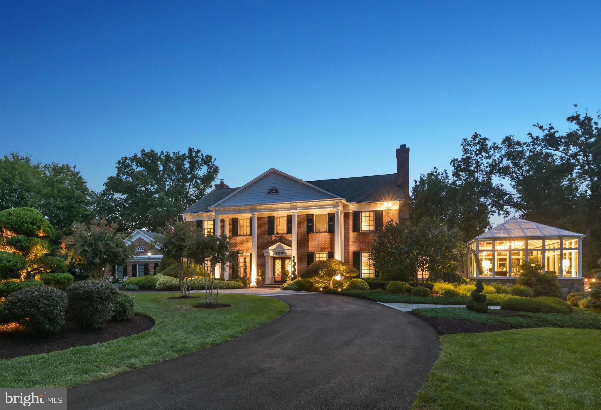 **Offers due Monday 9/25 at 12pm** Luxurious 5-bed, 5.5-bath all-brick Federal Colonial-style home with 3-car garage, breathtaking conservatory addition and nearly 7000 sq ft! With over $800K in meticulously-designed upgrades, this stately home with charming circular driveway is situated on a large picture-perfect 1-acre lot with professional landscaping, mature trees and space to expand or add a pool as desired. The redesigned front entrance (2017) with custom wrought iron Clark Hall door and German glass panels welcomes you to the grand foyer with curved staircase, marble tile floors and timeless chandeliers. The main level is an entertainer's dream - presenting recessed lighting and hardwood floors throughout the living room, adjacent formal dining room, office, family room, kitchen and breakfast areas. The gourmet Chef's kitchen is the heart of the main level boasting custom K&H cabinetry, granite countertops, large island, high-end stainless steel Viking appliances, Rohl faucet, Blanco sink, and exquisite Brian Greer tin ceiling. Savor a morning coffee in the eat-in breakfast area with peaceful views of the rear garden or enjoy a night cap in the adjacent family room with cozy wood-burning fireplace and upgraded wet bar including Viking wine fridge and new Scotsman ice maker (2022). Built in 2016, the massive Four Seasons sunroom conservatory in the east wing of the home with heated marble floors and over 100 windows provides a wonderful space to enjoy year-round sunshine and serene tree-lined views.  Conveniently-located main level powder room was renovated in 2017 with vintage E.J. Victor vanity, Ann Sacks mirrored tile, Phylrich faucet, Toto toilet and marble floors. When ready to relax, head to the second level owner's bedroom suite featuring wood burning fireplace, two walk-in closets and an ensuite spa-like bath with tiled floors, dual vanities, jetted soaking tub and stand-up shower. The attached sitting room is ideally-located to serve as an additional in-home office, nursery or reading nook. Three additional large bedrooms, two full baths and a spacious laundry room complete the upper level. Renovated in 2016, the fully-finished lower level with recessed lighting and heated floors boasts plenty of space for a game room or in-home theater plus a stunning full kitchen with Liebherr fridge, Euro Chef hood, Blanco sink, Dacor drawer microwave and granite countertops. Featuring a 5th bedroom, 2 full baths, fitness room, additional office, and extra storage, the lower level is perfect for an in-law suite or au pair apartment. Looking to de-stress after a long day? Step outside the rear of the home and let your mind wander in the serene garden with wood deck, enjoy an evening under the stars around the firepit on the stone patio off the conservatory, or watch kids and pets play in the fully-fenced (2018) rear yard. The attached 3-car garage with adjacent mud room plus long driveway provides all of the space you'll ever need for multiple vehicles, workshop and additional storage. A 48-amp Tesla charger and separate NEMA6-20 outlet in the garage offers EV charging for two vehicles. Other recent upgrades include Loewen windows (2008), custom Atlantic window shutters (2008), new garage doors and openers (2020) and new contemporary bedroom light fixtures (2023). 1-yr home warranty transferable to buyers. See the complete upgrades list for more details and check out the 3D tour and video walkthrough. With an idyllic location in the sought-after Potomac Bend community, this home provides the best of both worlds with a bucolic setting on a quiet cul-de-sac, yet just minutes to all of the dining and shopping that Kentlands, Rio, Crown and Bethesda have to offer. Don't miss this jewel of a home!