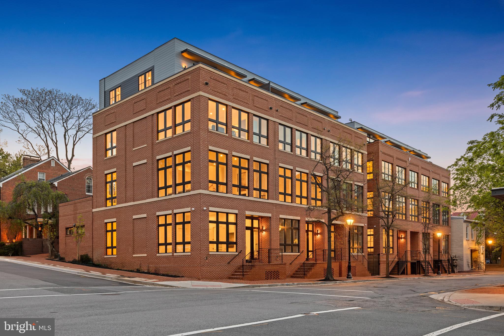 Situated along the most prestigious street in Old Town Alexandria—within one of the nation's most historic and desirable neighborhoods— 227 S Union Street is one of 6 newly constructed, LEED Gold-certified residences.  Welcome to River Row.   This home sets a new standard for luxury living along the Potomac River. Developed by the esteemed JC Development, this four-level home offers a rare combination of timeless architecture, innovative engineering, and a premier location—with no HOA or condominium fees.

Constructed from solid steel and concrete and clad in classic brick on all sides, the residence spans 3,366 square feet of interior living space and rises four stories via a private elevator. From the moment of entry, the architectural integrity is evident—soaring ceilings (up to 12 feet), oversized 9-foot solid core doors, 8 ½-inch wide white oak flooring, and expansive Andersen windows create a light-filled, contemporary atmosphere grounded in timeless materials.

The main living level presents an open-concept layout that seamlessly transitions the kitchen, living and dining areas  to a stunning 440-square-foot private outdoor terrace, finished in imported Spanish porcelain tile—an ideal setting for private entertaining or alfresco dining. The gourmet kitchen is anchored by soft-close American Woodmark cabinetry, Taj Mahal quartzite countertops, and a professional-grade appliance suite that includes a Thermador 36-inch five-burner gas range, double electric wall ovens, Bosch French-door refrigerator, Thermador dishwasher, and Sharp microwave drawer. Every element is thoughtfully selected to support elevated daily living and elegant hosting.

The upper levels are equally refined. Four spacious bedrooms—each with ensuite marble-clad bathrooms and Kohler fixtures—offer privacy and sophistication. The top floor opens to a 189-square-foot rooftop terrace with captivating city and river views in select residences. An additional fourth-level wet bar with Taj Mahal quartzite counters and a Summit beverage refrigerator enhances the rooftop experience.

LEED Gold certification recognizes high-performance energy systems, including recessed LED lighting, 2-zone Goodman HVAC with Ecobee smart thermostats, electronic air filtration, humidifiers, a Rinnai tankless water heater, and a full home sprinkler system. These systems contribute to lower utility costs, superior indoor air quality, and long-term sustainability.

Additional features include an 800 lb capacity private elevator servicing all four floors, integrated surround sound, Akuvox smart doorbell, and multiple laundry hookups. The lower-level family room includes a second wet bar with Taj Mahal quartzite countertop and a dual-zone Newair beverage refrigerator, ideal for casual gatherings or movie nights.

The oversized two-car garage is designed with a low-profile door for enhanced headroom, and includes a Kwikset keypad entry lock for added convenience. This residence is delivered with a California Closets credit for personalized wardrobe systems.

This is an extraordinary opportunity to own a piece of newly built excellence on one of Old Town’s most iconic blocks. Located just one block from King Street and mere steps to the Potomac River and waterfront promenade, River Row offers unmatched access to the city’s finest shops, acclaimed restaurants, cultural landmarks, and outdoor recreation. With over 20 dining options within a three-block radius, four parks within six blocks, and proximity to top-rated Lyles-Crouch Elementary School, this home supports an effortless and enriched lifestyle. Commuters will appreciate the easy access to Reagan National Airport (3.7 miles), King Street Metro and Amtrak/VRE Station (1 mile), and nearby thoroughfares connecting to Washington, D.C. and National Landing.
