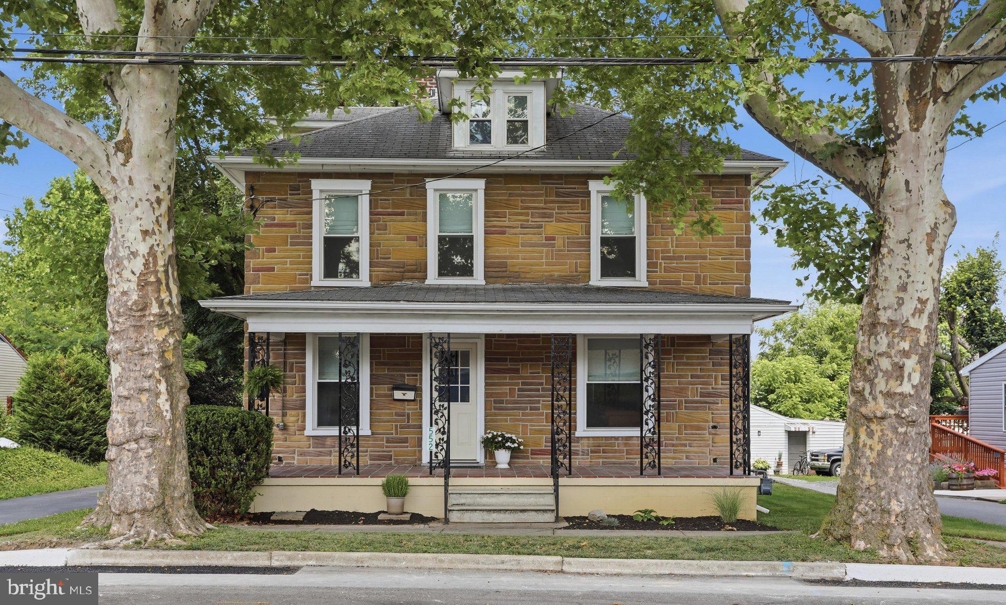 *Check Out the 3D tour!* Greencastle downtown charm with some space to breathe! This two story, stone faced home with wide covered front porch could be the space you've been dreaming to make your home. With a classic foursquare style build, this home has plenty of space, and none of it is wasted. The entry room provides space to welcome guests (with a nice dose of central air conditioning), which connects to the living room, and then around to an open kitchen/dining area. Off the dining space is a full bathroom on the main floor. The kitchen offers granite countertops, white cabinets, and updated appliances. Heading toward the back of the home is a mudroom space that connects to the large laundry room that can double as a storage space/pantry area if you chose. Upstairs there are 4 nicely appointed bedrooms and a full bathroom with two sinks. Privacy is always a nice thing to have moving in so the custom shades in a nice neutral fabric material will be staying for the next owner. The attic access is through bedroom number 4 (currently being utilized as a large walk in closet), which has true stairs to walk up for any storage space. Going back downstairs, there's an inside entry to the basement, but also one that leads in from the driveway side of the house. The basement is unfinished, but was used as a home gym space by current owner. The electric water heater was new in 2021. Moving to the exterior of the home, the covered front porch is a fantastic spot to sit and relax, or hang out in the backyard which goes out past the massive 3 car detached garage! An approximately 24x47' garage is definitely going to come in handy either for tinkering with your vehicles or just storage space without paying for a storage unit.
All of this in charming Greencastle PA. With its annual Sidewalk Days, triennial Old Home Week, Grub & Pub Festival, and 3 Sheetz locations, there's always fun to be had. Access to I-81 is less than 5 minutes away, a book store, coffee house, ice cream and dessert shops, spa, and so many more shops within walking distance are conveniences you can get used to. Greencastle Golf Course is public golf course only a 5 minute drive away. The gas line outside was replaced last year and the town is currently finishing some roadwork there in relation to this. Fiber as well as Xfinity internet options are available.  Age of home is unknown. Tax records do not show year built. 1920 is a placeholder figure and estimate based on surrounding homes and characteristics of home.