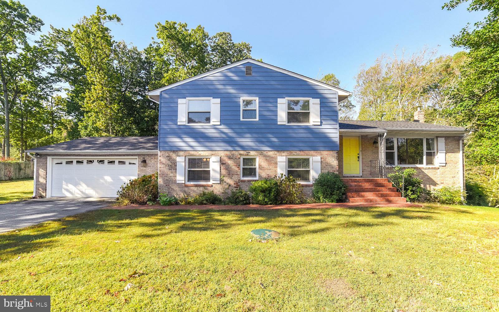 This beautiful split level home is tucked away on a quiet lot in the Town Creek neighborhood. Pride of ownership shows in the home's meticulous appearance. This home showcases a beautiful kitchen with stainless appliances, white cabinets and a huge island with lovely granite as well as upgraded lighting. The range-hood and subway tile each add a special touch and make this kitchen a joy to work in. The hardwood floors show well as do the upgraded bathrooms. There are three bedrooms on the upper level. The fourth bedroom is on the lower level as well as the large laundry room with cabinetry and a deep sink. Also in the lower level is another living space and a pellet stove (one year old) to make those chilly winter evenings cozy and inviting. The second lower level is unfinished and offers a huge amount of storage space.  The roof is only one year old, the heat-pump four years old and the hot water heater five years old, so little to nothing to worry about there. Additionally, sellers are providing a home warranty. This one is a gem!