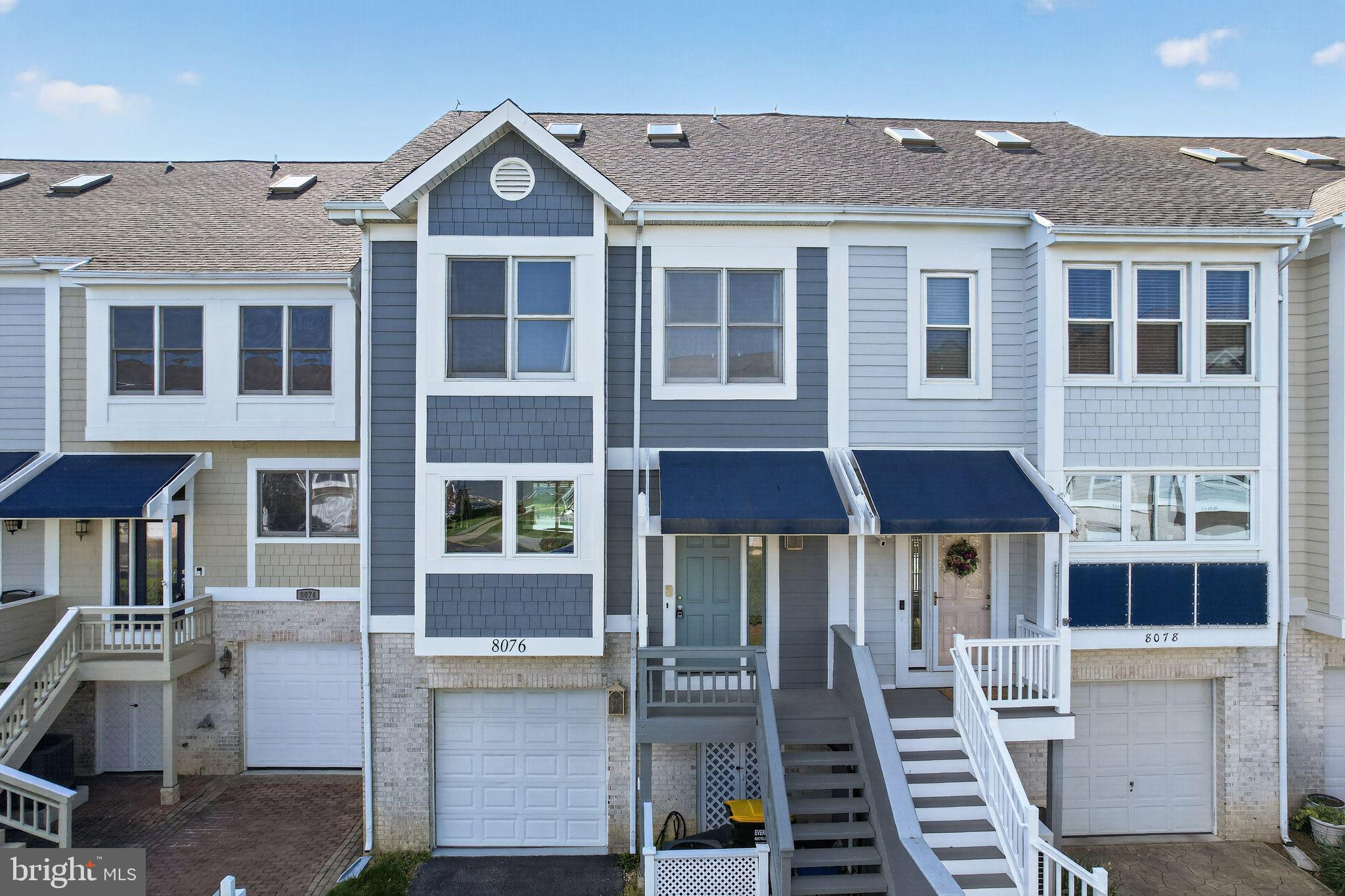 COASTAL LUXURY MEETS EVERYDAY VACATION LIVING in Windward Key on the Chesapeake Bay. Experience the ultimate waterfront lifestyle in this four-level townhome nestled in the sought-after Windward Key community in the heart of Chesapeake Beach. Whether you are searching for a full-time residence or the perfect weekend retreat, this exceptional home offers resort-style living with water views and upscale amenities throughout. Designed for both comfort and entertaining, the home features 4 bedrooms, 4 full baths, and 1 half bath across four spacious levels filled with natural light. The main living level showcases a well-appointed kitchen, dining area, and expansive great room with a cozy gas fireplace — all enhanced by water views and an open, airy feel. The upper level hosts the primary suite along with two additional bedrooms, while vaulted ceilings create an inviting sense of space and elegance. The top level offers exceptional flexibility with its own full bath, wet bar, and private deck, ideal for a home office, guest suite, lounge, or entertainment space overlooking the Bay. The entry level provides additional finished living space with a full bath, perfect for guests, recreation, fitness, or flex living. Direct access to the attached one-car garage adds convenience and functionality. Outdoor living is elevated with multiple decks on every level, creating seamless indoor-outdoor enjoyment and endless opportunities to relax and take in the coastal setting. Residents of Windward Key enjoy exclusive amenities including a waterfront pool overlooking the Chesapeake Bay and a private beach. Located within walking distance to restaurants, shops, parks, boardwalks, marinas, nature trails, and local entertainment, this is Chesapeake coastal living at its finest.