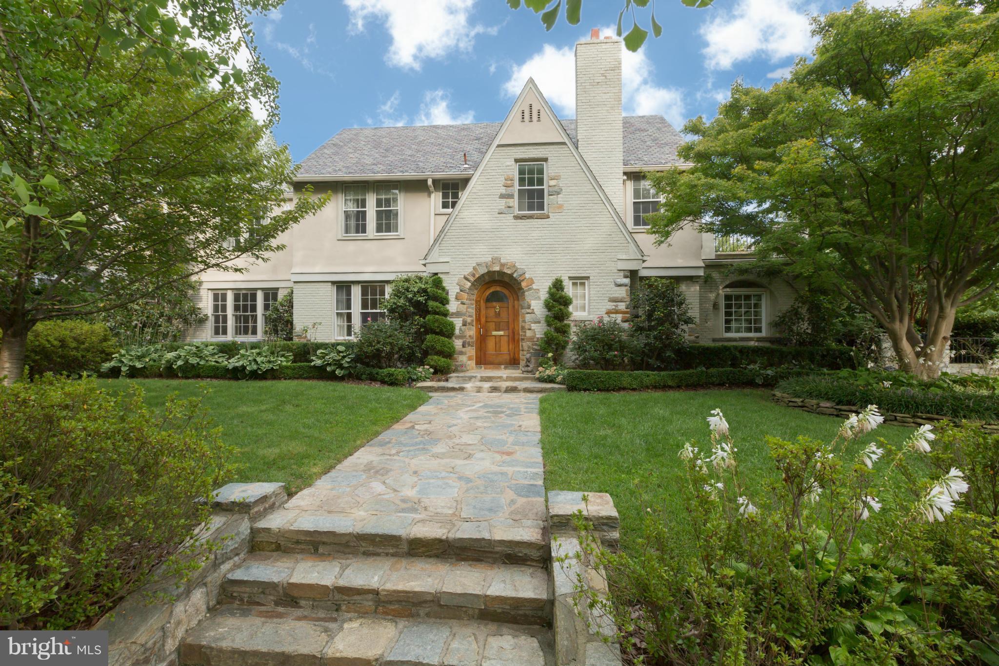 Romantic, private and mature English-style gardens embrace this picturesque 1926 Tudor residence, located on an expansive lot in the heart of Wesley Heights. Property features spectacular pool with water features & a two-bedroom 910 square foot guest cottage built in 2008. Elegance in an incomparable setting of beauty and convenience.