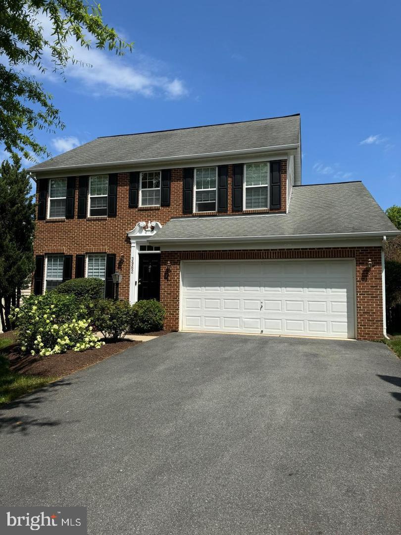 Welcome to this beautifully maintained and freshly painted single-family home located on a quiet street in the highly desirable Villages of Urbana. Offering three finished levels of living space, this move-in ready home has been thoughtfully updated with kitchen appliances (2022), HVAC system (2022), water heater (2023), and a new roof (2026), providing peace of mind for years to come. The main level features a flexible front room perfect for a formal dining room, home office, or additional living space, while the spacious kitchen opens seamlessly to the family room, creating an ideal layout for everyday living and entertaining. A convenient laundry area and powder room complete the main level. Upstairs, you'll find four generously sized bedrooms, including a spacious owner's suite with a private bath, along with a full hall bathroom. The finished walk-up lower level is perfect for entertaining and includes a wet bar, full bathroom, and versatile recreation space. Step outside to enjoy the rear deck overlooking a large, flat fenced backyard, offering plenty of room for outdoor gatherings, play, pets, or simply relaxing. An attached two-car garage provides added convenience and storage. Residents of the Villages of Urbana enjoy award-winning schools and exceptional community amenities, including three resort-style pools, clubhouses, fitness centers, tennis and pickleball courts, walking trails, playgrounds, community gardens, shopping, dining, and a public library. Combining major updates, a versatile floor plan, an expansive backyard, and an outstanding location, this home is ready to impress.