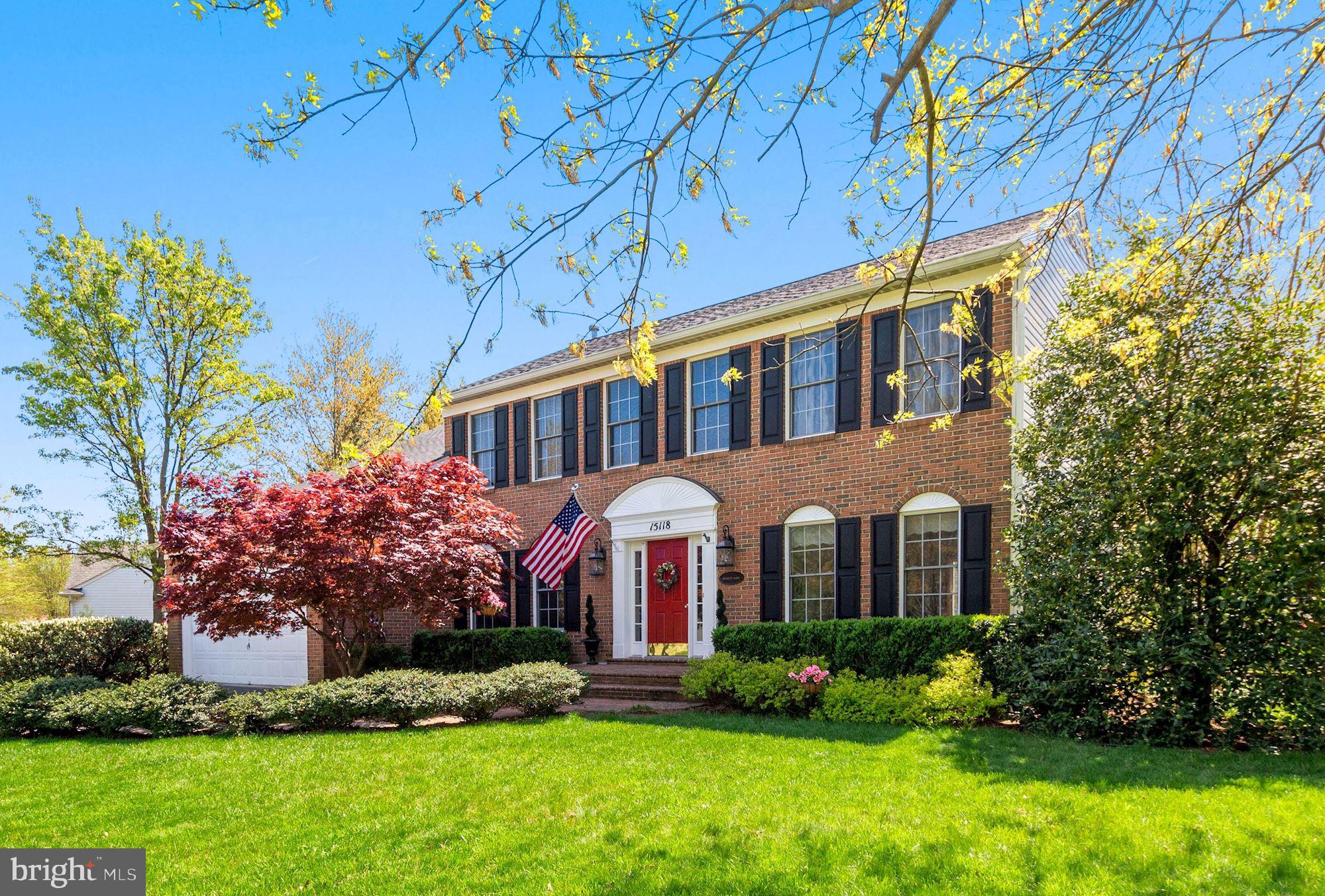 Welcome to 15118 Briarcliff Manor Way, a classically beautiful and well-appointed 5 Bedroom and 3.5 Bath Colonial in the lovely neighborhood of Briarcliff Manor. Spanning approximately 4,280 square feet, this elegant home has generous and well-proportioned living spaces, gleaming hardwoods, and custom millwork throughout. An incredible feature of this home is the tranquil and stunning outdoor space that includes an expansive Screened Porch, a Deck, and a Patio that looks out to a lush and landscaped Backyard. There is an attached Two-Car Garage and a long driveway for ample parking. Briarcliff Manor is a welcoming and charming neighborhood that is surrounded by a number of public parks, a variety of restaurants and shops, and popular commuter routes. The community boasts a walking path, common green space, and a playground.   15118 Briarcliff Manor Way begins with a wide Foyer that is anchored by both the formal Living Room and formal Dining Room. The Living Room has an adjoining Office/Study with a wall of built-ins. Beyond the Foyer is a fantastic Family Room that is warmed by a gas fireplace and provides access to the Rear Deck. The bright and updated Eat-in Kitchen is graced with granite counters, stainless steel appliances, gas cooking, and an adjacent Breakfast Room with a bay window. From the Breakfast Room, there is access to the amazing Screened Porch that also leads to the Deck. The Screened Porch is a coveted feature that is accented by skylights, a vaulted ceiling, and a ceiling fan. With sweeping views of the backyard, this is bound to be a favorite all-weather space for the entire household.  There are Four Bedrooms and Two Full Baths on the Upper Level, including a gorgeous Primary Suite that is comprised of a separate Sitting Room/Office/Nursery, a walk-in closet, and an En-Suite Bath. The Three Secondary Bedrooms share one hall Bath.   The finished Lower Level is nearly 1,300 square feet and showcases a huge Recreation Room with a bar, a Fifth Bedroom, a Full Bath, and a sizable Storage Room.