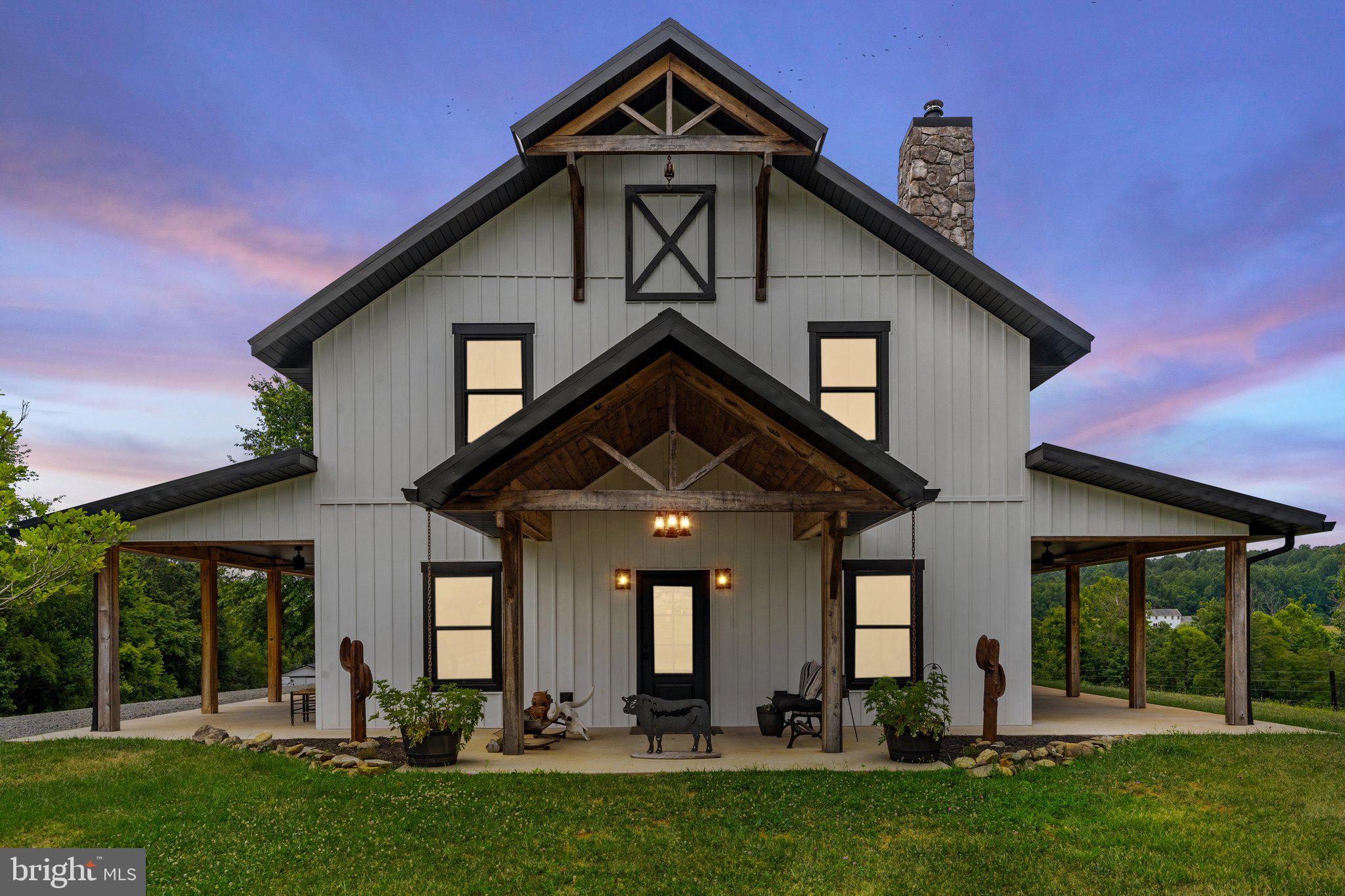 *Show Stopper*Custom barndominium by local builder located on almost 16 acres with 1 bedroom/1 bathroom guest cottage - perfect for long term guests or rental income*Nestled in the heart of rural Culpeper County, this home has been thoughtfully designed with custom features throughout*Over 3000 square feet of living space with 4 bedrooms & 3 full bathrooms*Expansive patios are located at every entrance to the home*Enter into the open concept floor plan with polished concrete floors on the main level*Gorgeous gormet kitchen with Viking appliances, handcrafted hickory cabinets & spacious island*Butler's pantry with main level washer/dryer & prep area*Full bath with extra large shower & live edge custom vanity*Custom doggy wash area with access to fenced yard*Upstairs you'll enjoy the stunning primary suite with wet bar, sitting area & door to balcony overlooking the water views*The primary bathroom has custom pebble flooring, double vanity & soaking tub*There is no shortage of closet space - check out the walk-in closet with washer/dryer as well as the cedar closet & special nook for jewelry*Two additional bedrooms share a full hall bath*So much thought was put into this home - from the custom light fixtures to hand crafted railings and hidden storage . . . This is truly a one of a kind property*Most of the land has been fenced for livestock*Enjoy the pond views while you relax by the smokeless firepit*With pastoral and water views from almost every window, you'll never regret calling this home*