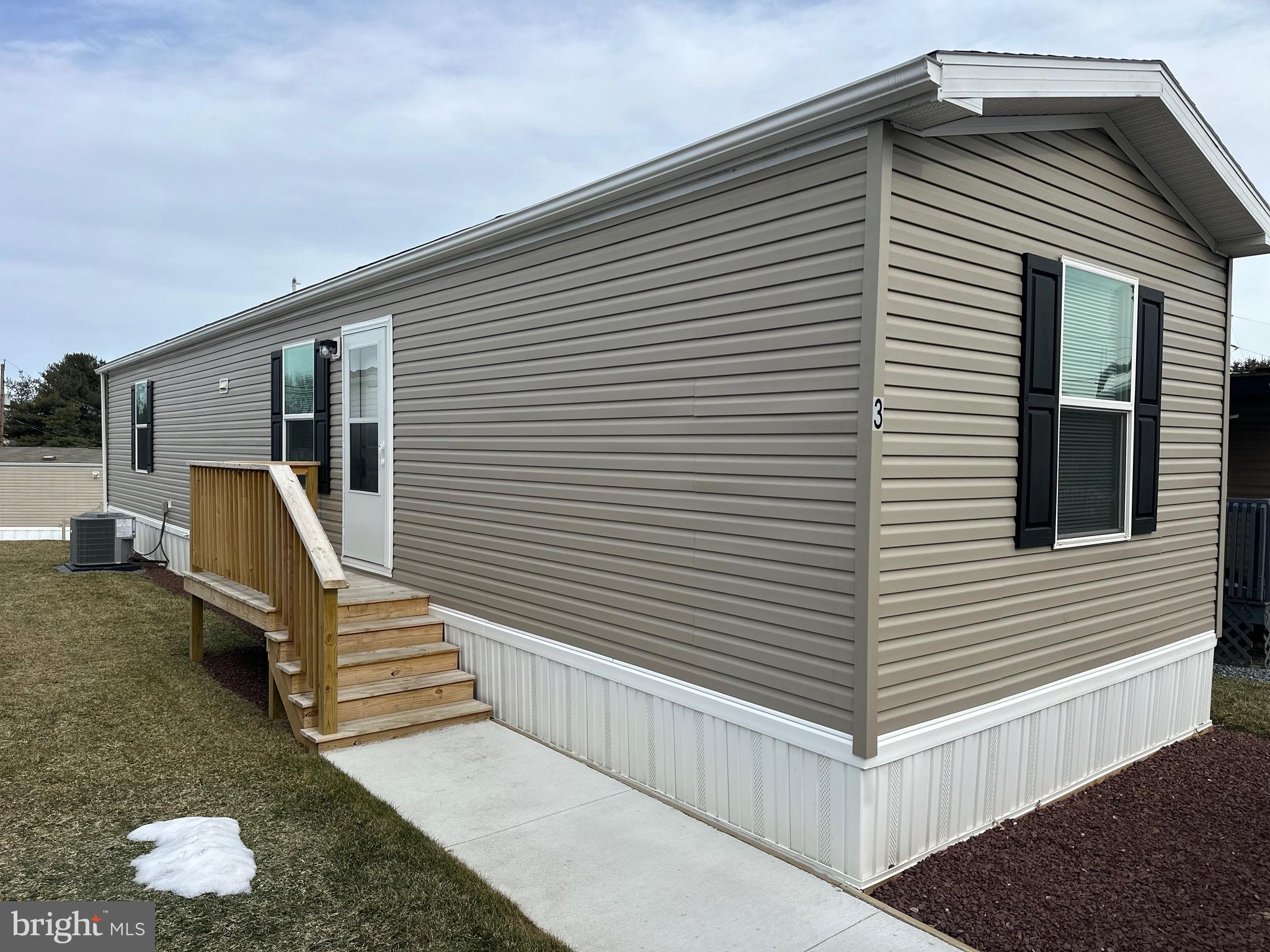 Brand New all 1 floor manufactured home with  2 bedrooms and 2 baths. Very nice kitchen that flows into the living room. Laundry room next to kitchen. Front bedroom has a closet and its own full bath. Larger main bedroom also has its private bathroom.  Base lot rent of $675 per month. Utility fees of $60 per occupant which includes refuse, water, sewer, common area maintenance including snow removal, mowing and landscaping. Owner is responsible for their yard mowing and driveway snow removal. Pets are permitted but there are restrictions and fees on a monthly basis at $20 per pet per month not to exceed 2.