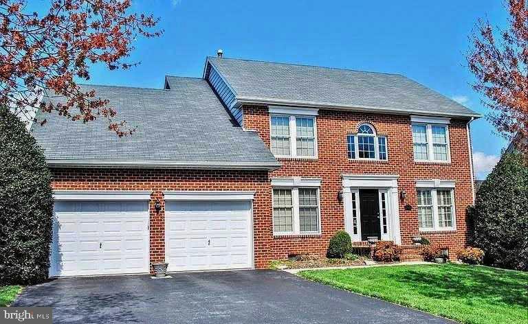 Rare opportunity,  All-brick colonial on one of Whittier's most coveted cul-de-sac lots. Stunning gourmet kitchen with oversized granite island, custom cabinetry, stainless steel appliances & gas cooking. Dramatic two-story family room with vaulted ceilings, gas fireplace & custom built-ins. Gleaming hardwood floors throughout the main level. Private rear porch overlooks mature landscaping on nearly 1/3 acre. Luxurious bathrooms. Expansive finished lower level which offers endless possibilities includes a full bath. 2-car garage. HOA includes 3 pools, tennis, lake & trails. Minutes to downtown Frederick & I-270. Homes of this caliber rarely come available.