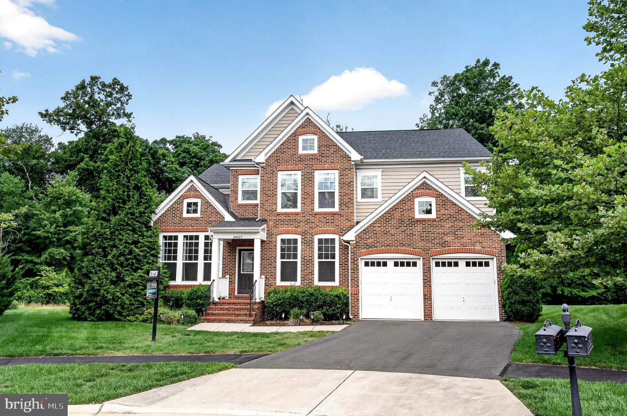 Welcome to the exclusive community of TANGLEWOOD!

This impressive residence, meticulously maintained by its owner, embodies the essence of elegance and comfort. With 5,000+  square feet of light-filled living space and an open floor plan, this home offers an unparalleled living experience.
Unmatched Privacy & Architecture, strategically positioned at the end of a private cul-de-sac, on approximately 0.3 acre of serene land, this architectural gem seamlessly blends luxury with tranquility. The main level dazzles with exquisite hardwood floors and a gourmet dream kitchen, featuring a central island, stainless steel appliances, granite countertops, and a built-in oven and microwave designed to meet every culinary need with extensive storage and modern flair.
In this outdoor Sanctuary, Immerse yourself in the enchanting experience of our prominent deck with breathtaking forest views. The property also features a private patio, perfect for outdoor activities, gatherings, or simply enjoying the serenity and the sweet singing of birds by the firepit. It is the perfect retreat, to embrace the natural atmosphere in total privacy.
Versatile & Spacious Living: the main level includes a bright, relaxing office and a great room with a fireplace that opens to the kitchen. A significant advantage of this home is the generously sized main-level bedroom with a full bathroom, this layout ensures convenience and flexibility offering easy access and privacy on the main floor.
Upper Level Grandeur: the upper level hosts a massive primary suite with separate spacious walk-in closets and a luxurious bathroom with a deep soaking tub and separate shower. Three additional generous secondary bedrooms (one with an en suite private bathroom ) and an additional versatile area, perfect for a game room, second office, or media center complete this floor.
Finished Walk-out Basement: the bright basement features an independent exit, a complete bedroom with a full bathroom, a spacious dining/lounge area, and massive storage space. An attached 2-car garage completes this dream residence.
Location & Lifestyle Located in an extremely tranquil neighborhood near highly ranked and sought after schools (Willard, Hovatter, St. Paul VI, Lightridge, among others). Enjoy quick access to Dulles Airport, shopping, and Braddock Road for easy commuting.
Welcome home.