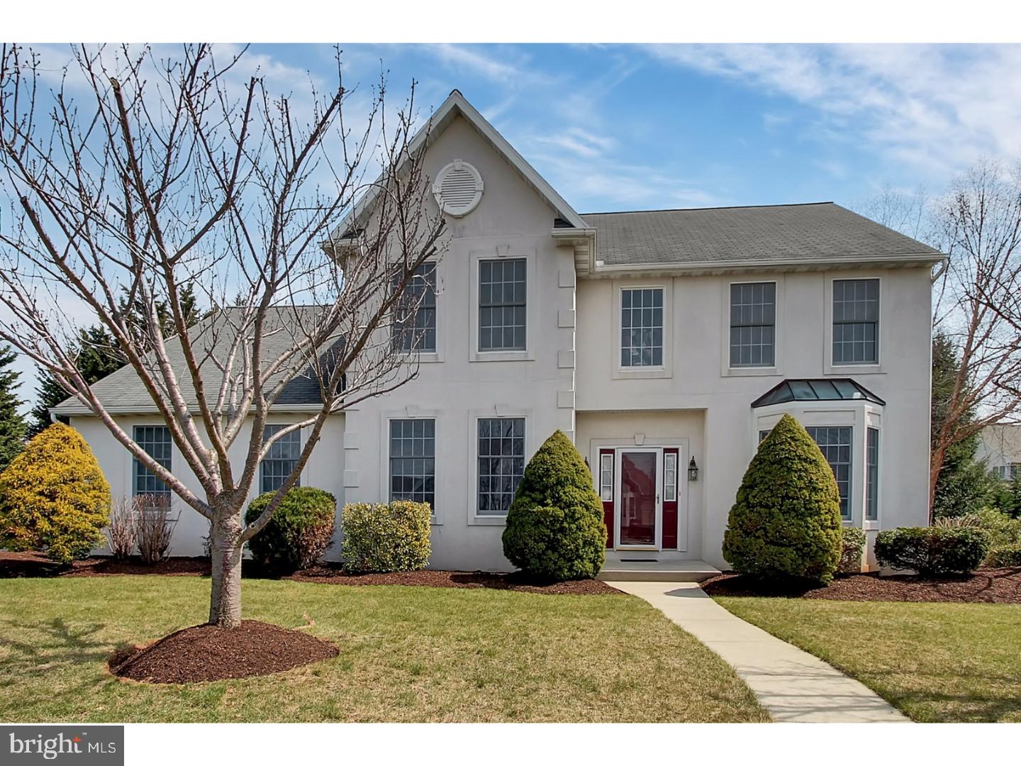 Gorgeous in Spring Ridge!  This immaculate and spacious home opens into a dramatic 2-story foyer with beautiful new Maple hardwood flooring running through the living room, formal dining room, and private first floor den/office.  The kitchen is equally impressive with beautiful granite counter tops and tiled back splash, stainless steel appliances, and breakfast island, all in an open concept that ties seamlessly into the family room with a vaulted ceiling, skylights, gas fireplace, Brazilian Cherry hardwood floors, and a wall of windows. Upstairs you will find four large bedrooms, a double sink hallway bath and an upgraded master bedroom suite complete with a walk-in closet, and full bath with tiled shower and soaking tub. Outside you will find mature landscaping, a partially covered deck with skylights and a ceiling fan and a nice, flat semi-private back yard. Call today for your private showing. One year HMS Home Warranty included.
