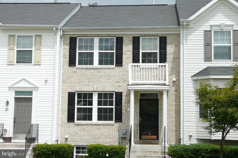 Brick front townhouse located on a nice cul-de-sac in Bunker Hill. 3 full levels of living and a fenced back yard. The master bedroom has a vaulted ceiling, walk-in closet and a master bath with separate tub and shower. Just renovated! New wood floors, ceramic tile, new appliances, lighting and finished lower level with 4th bedroom, family room, large laundry room and full bath.