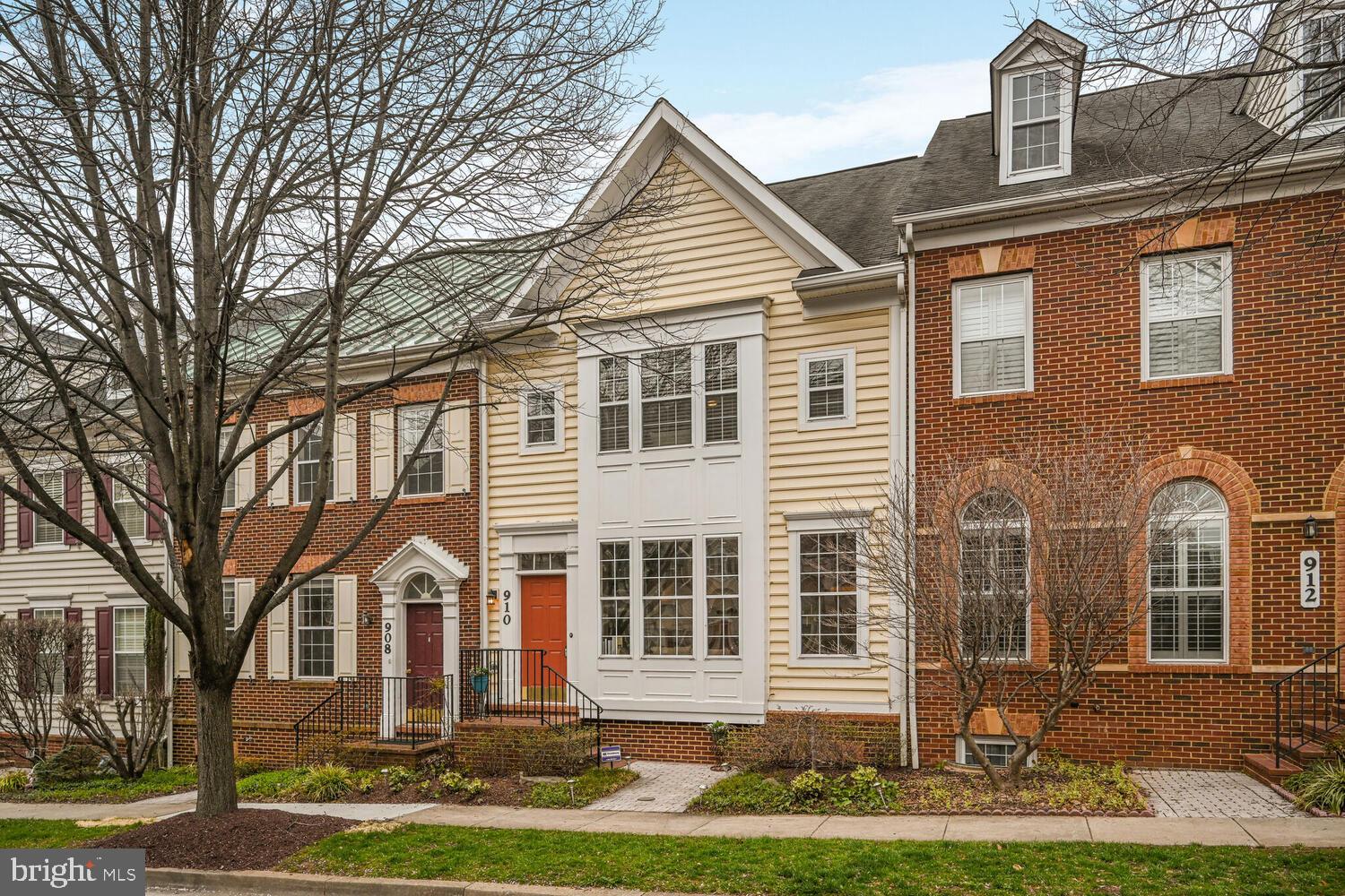 Offers due Monday April 7 by 6:00 PM - seller response Tuesday morning. 
This townhome shows beautifully and offers bountiful living space on 3 fully finished levels, all  extensively upgraded and renovated. The Main Level Primary Bedroom Suite includes a renovated designer Primary Bath, washer/dryer and good closet space.  The recent kitchen makeover provides a stunning designer kitchen with center isle and new Samsung appliances. The generous Living Room area flows to the Dining Room, offering plenty of comfortable space for living and entertaining. The upper level of the home offers two very large bedrooms each with ensuite full baths, plus a large open space suitable for an office, family room or additional bedroom.  The fully finished lower level contains a large family/recreation room, full bath, exercise room, bedroom/office and large storage area. Hardwood floors, designer fixtures, new carpeting, and soaring ceilings combine to make the interior extraordinary. Outdoors, there is a small deck accessed through the kitchen providing outdoor space for sunning and relaxing. The 2-car garage is located off an alley at the back of the home. Located in the King Farm community, this house is steps from the community pool, Matty Stepanik Park, free bus to nearby Metro, Safeway, King Craft Beer and Bar, Coffee Republic and several great neighborhood restaurants. Solar panels convey with the house (owned not leased); utility bills are very low and owners receive substantial rebates for energy generation. Welcome to this wonderful property!