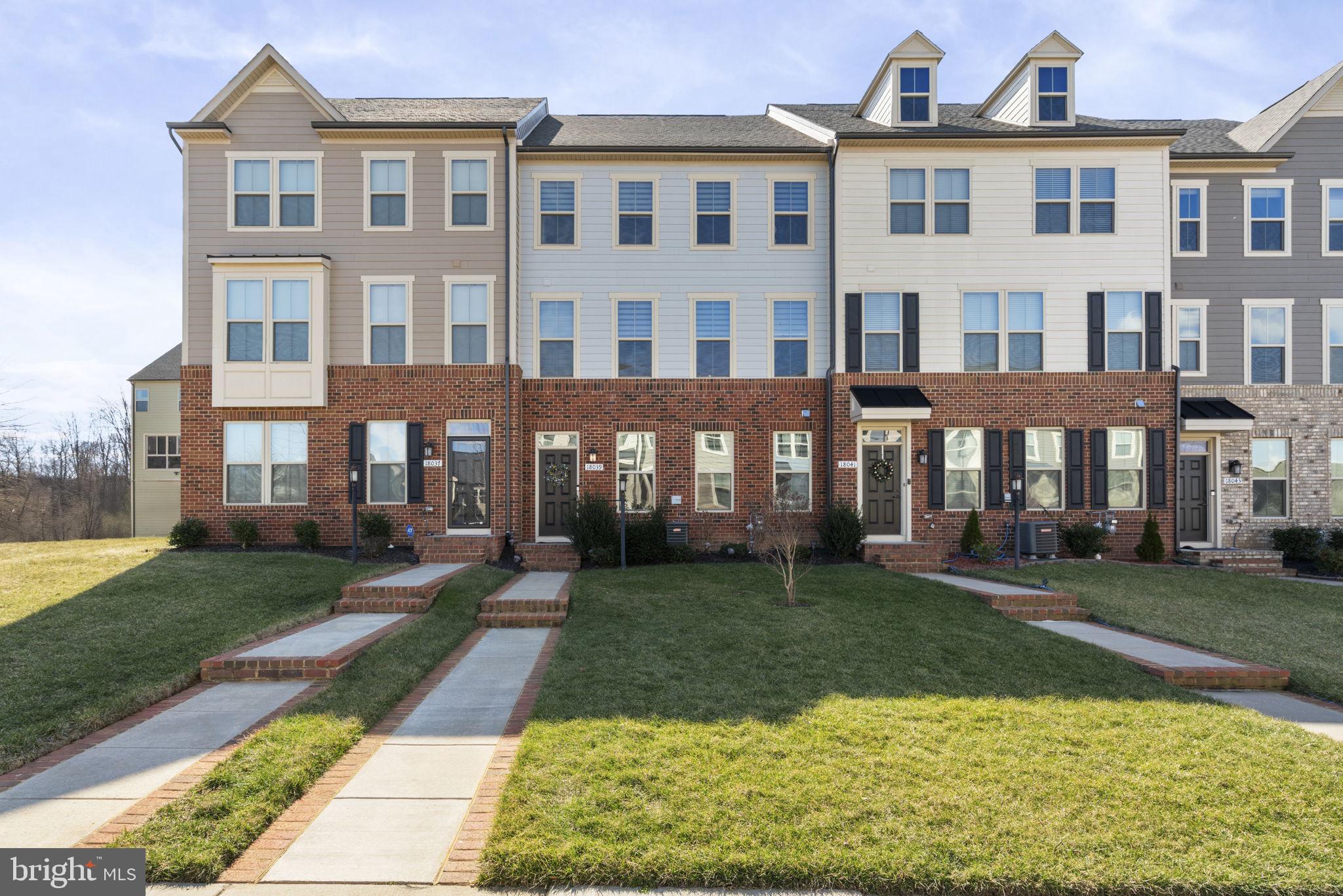 HURRY!!!  This INCREDIBLE VALUE in Potomac Shores is the best price per square foot in the community!** This home also qualifies for a $10,000 Grant to be used for closing costs**  Have your agent call us for the Lender that is offering that program.  Hurry, someone is going to get an AMAZING DEAL!  This is a McPhearson Grand Townhome! That means you get 2500 square feet of finished living space plus, the coveted rear-covered enclosed porch with a fireplace and a two-car rear-loading garage! This home is only five years old and features an open-concept design with LVP flooring on the main and upper bedroom levels and hardwood stairs with iron rails! The beautiful gourmet kitchen has espresso cabinets, a large center island with white quartz counters, a modern white backsplash, and stainless appliances.  Walk through the double sliding glass door to your soon-to-be favorite place to download your day, chat on the phone, or kick back with friends and a glass of wine!  The rear covered porch has a  3-season glass enclosure with screens open, for cross ventilation on beautiful days. There is an outdoor gas fireplace to heat and enjoy all year round! Head upstairs to the upper level, which features a spacious primary suite with a large walk-in closet, a luxury bathroom with a soaker tub, a large shower, and a separate water closet! There are two ample-sized secondary bedrooms, a full bath with dual vanity, and a convenient laundry room. The lower level features a recreation room full of natural light, a full bath, and access to the garage with a built-in drop zone for coats, shoes, etc in the lower level rear foyer.. The park-like setting out front sets this home apart, with a large common area. This home is three-quarters of a mile to the future town center and about a quarter-mile walk to the newest community pool. Potomac Shores is an amenity-filled community with pools, multi-purpose courts, playgrounds, community gardens, hiking trails, a recreation facility with a full-size gym and movement rooms, collections, and Jack Nicklaus's signature golf course. The Shores Club is the heart of the community and is where all the social functions happen. The community has a very active social calendar with events for all residents. You will find classes, clubs, meetups, movie nights on the lawn, and more. Professional photos are coming soon. HOA Fee includes 150/150 internet, trash, snow removal, trails, three pools, a gym, access to The Shores Club, and all resident-sponsored social events.
