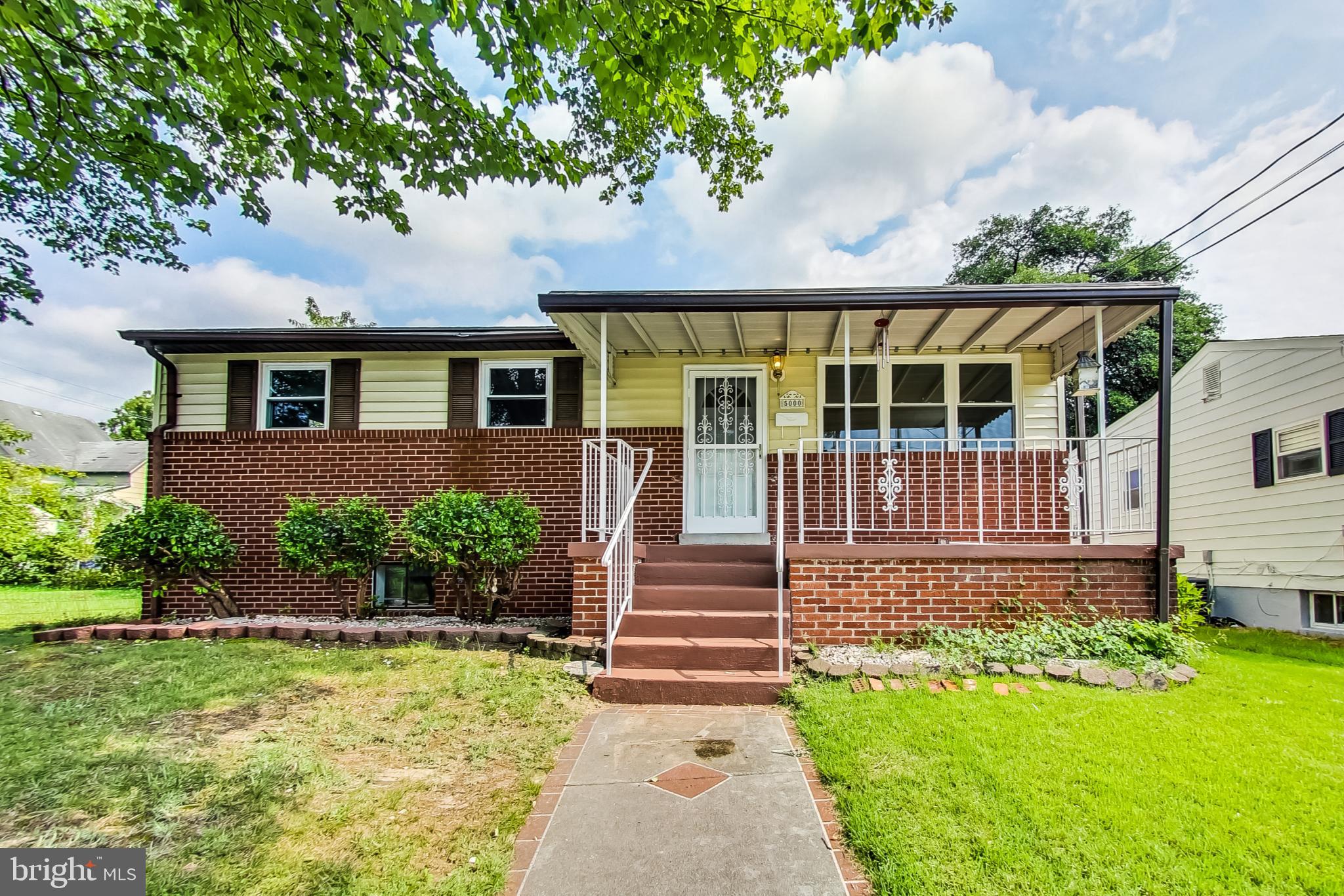 Welcome to this charming brick-front rancher boasting 3 bedrooms, 1 bathroom, and a covered porch, offering comfort and convenience. The kitchen addition with a separate entrance adds versatility to suit your needs. The finished basement creates possibilities for a potential 4th bedroom, accommodating guests or serving as a home office. The double-paned vinyl windows enhance energy efficiency and insulation. Newly refinished hardwood floors and updated bathroom flooring add elegance. Freshly painted throughout, this residence feels new and can be personalized to your style. Storage is ample with an attic and a large shed in the private backyard. Enjoy a convenient location near Greenbelt Metro, the University of Maryland, shops, and dining. Embrace the opportunity to call this charming rancher home, offering a harmonious blend of comfort, functionality, and accessibility. Don't miss this chance!