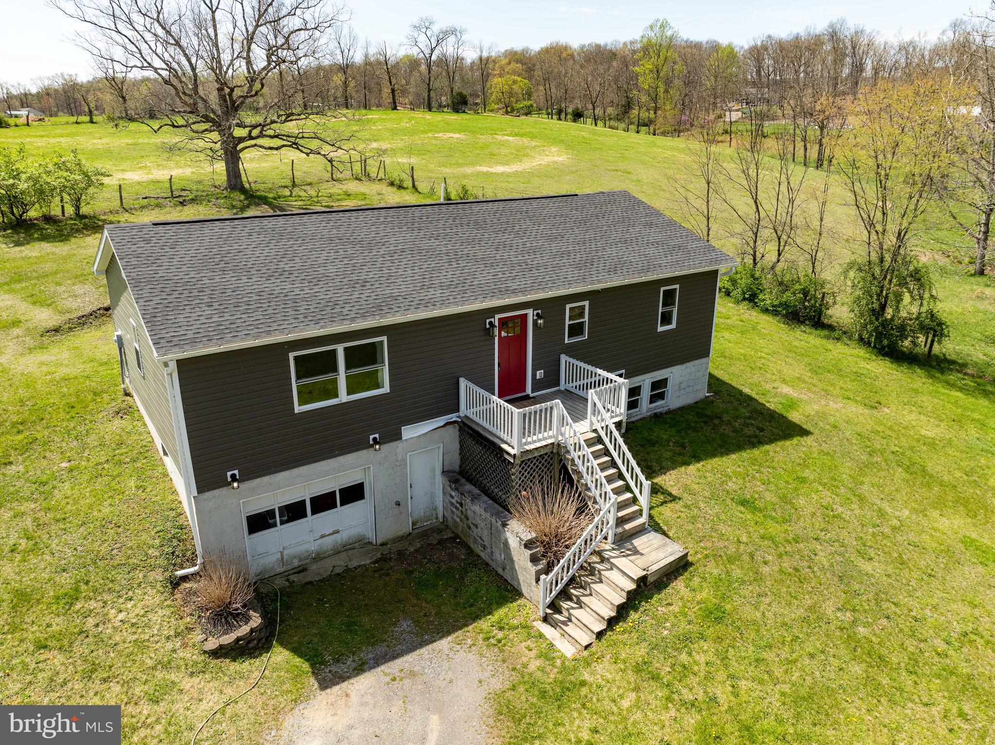 Peaceful location amongst the rolling hills and farm land. All the hard work has been done! Within the last 5 years, new windows, exterior doors, siding, flooring, roof, Kitchen and baths, water heater and plumbing.  Great open concept living.  The Kitchen has an over abundance of soft close cabinets, built in pantry and butcher block island.  LVP throughout common areas and into Primary BR.  Baths are remolded and have LVT flooring.  Large unfinished area in the basement for future expansion or storage.  19 X 26 Garage is integrated, and is an oversized 1 car+.  Seller is being re-located and while there are still a few projects to be completed, the house is quaint and energy efficient with room to expand and put your final stamp on.  Due to time constraints, Seller will be unable to make any improvements prior to closing.  Delayed closing til end of June required.