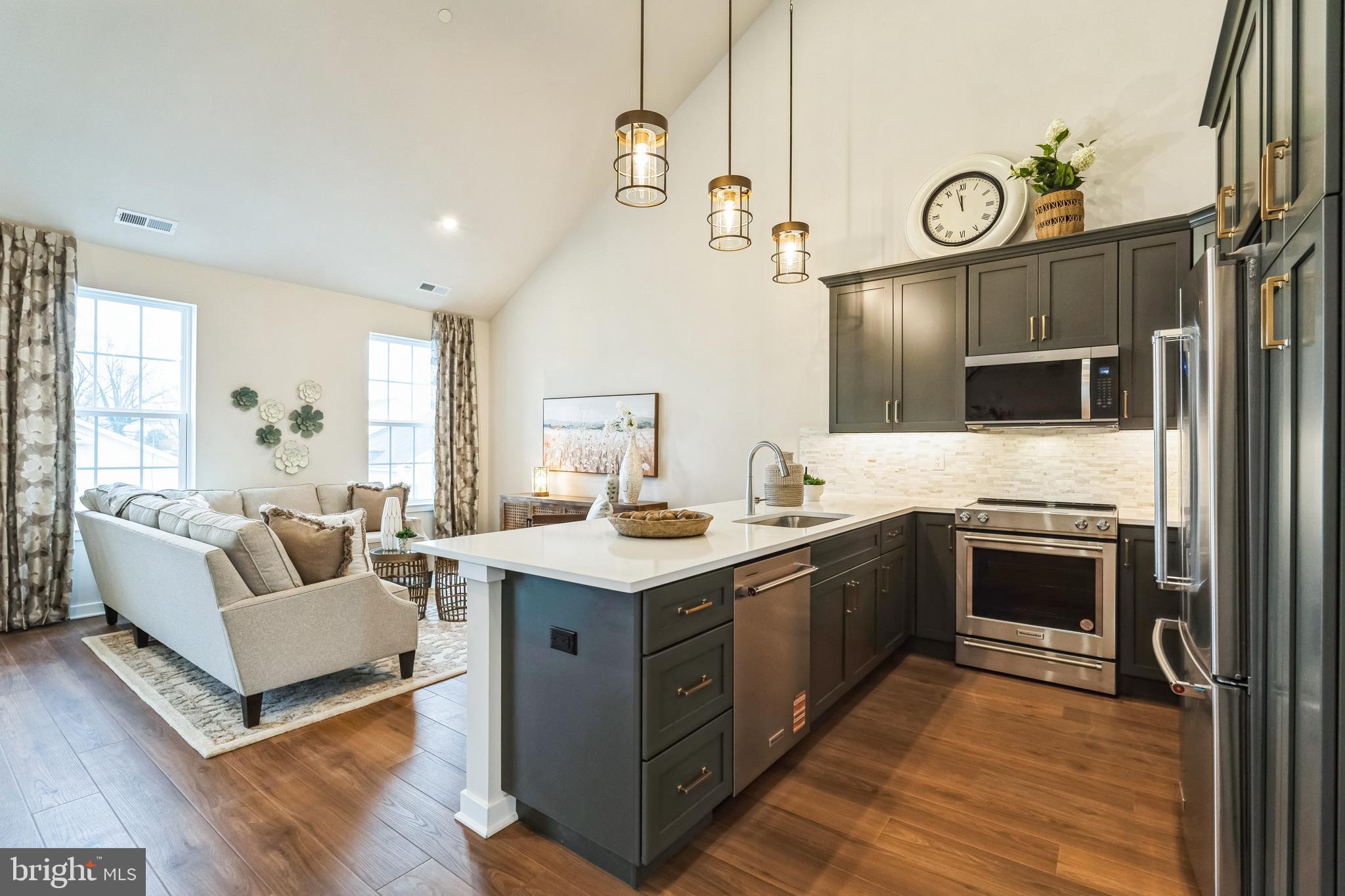 WE ARE OFFERING ONE YEAR PAID HOA DUES FOR 2026 PLUS A FREE WHIRLPOOL REFRIGERATOR, WASHER & DRYER!. ALSO RECEIVE A $2,000 GIFT CARD TO RAYMOUR & FLANIGAN AT SETTLEMENT!
Welcome to The Villas at Greenbrook 55+ Community!   This 2nd floor Chancellor spec home is stunning! Loaded with upgrades! Complete with 2 beds, 2 baths and an open concept kitchen, dining area & great room with vaulted ceilings is an absolute WOW factor!  Perfect for entertaining or just relaxing. The kitchen is a chefs delight with Quartz countertops, 42" cabinets,  beautiful backsplash, large island that easily seats 4 to 5 people &  Whirlpool appliances. The Primary Bedroom is spacious with a walk in closet & easily accommodates a king size bed.   Step into  your on suite bathroom  complete with a walk-in shower, linen closet and double vanity.  The 2nd bedroom is perfect for guests.  A hall bath and laundry complete the first floor.  Head upstairs to the large loft  perfect for an office/game room/den. This space has endless possibilities!   
Enjoy the Clubhouse complete with  fitness room, large gathering room w/fireplace & game room. You will enjoy relaxing by the outside pool during the hot Summers or lounging on the covered patio!   
This is a 55+ Active Adult Community.  Come tour this home today!

INTERIOR PHOTOS ARE OF THE CHANCELLOR MODEL HOME & NOT THIS PARTICULAR  HOME. 

*Subject to errors, omissions and changes without notice.