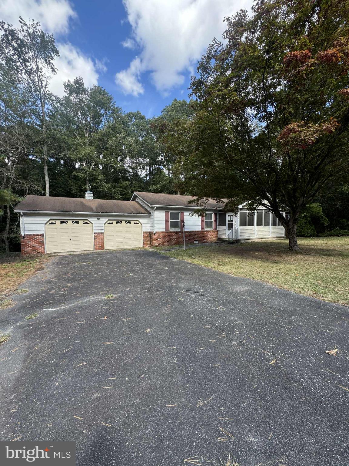 This spacious home offers more than 2,000 square feet of interior living space and is situated on a beautiful 1.70-acre lot—providing the perfect blend of privacy, square footage, and is bursting with potential. Nestled just outside town yet easily accessible, the location offers the best of both worlds: room to spread out with convenient access to major routes, shopping, and services.
Inside, you'll find a well-designed floor plan that includes a formal living room, dedicated dining area, and an additional expansive family room that could serve as a game room, media lounge, home office hub, or multi-generational living space. The generously sized primary bedroom includes an en suite garden tub—ideal for relaxing after a long day. Two additional bedrooms and a centrally located hall bath round out the private living quarters.
A two-car-attached garage offers ample storage, workshop potential, or secure parking. Outdoors, the home overlooks a private wooded backdrop, perfect for enjoying natural surroundings or creating a future outdoor entertainment area. The deep lot creates a peaceful setting with room for landscaping, gardening, or simply enjoying the open space.
With its flexible layout, sizable footprint, and tranquil setting, this home presents a rare opportunity for buyers looking to personalize and create long-term value. Whether you're looking for a home with room to grow, a property to customize, or just more space inside and out—this one is worth a closer look.