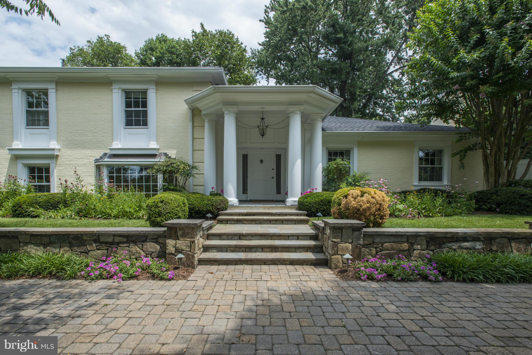 Renovated and expanded!  Shows beautifully! Amazing space! Living room w/ FP, Gracious Dining room w/ built in shelving, Lib w/ built ins & FP, tbl spc Chef's Kit w/ island, roomy Family room, MB w/FP, sep. BA w/ sauna, & walk in closets, 4 add. BRs. In-law suite w/ sep entr & LR/Kit, Office, LL Game/fam room w/ FP, exercise room, LA. 2 car att Gar.  Lovely pool size garden and more!