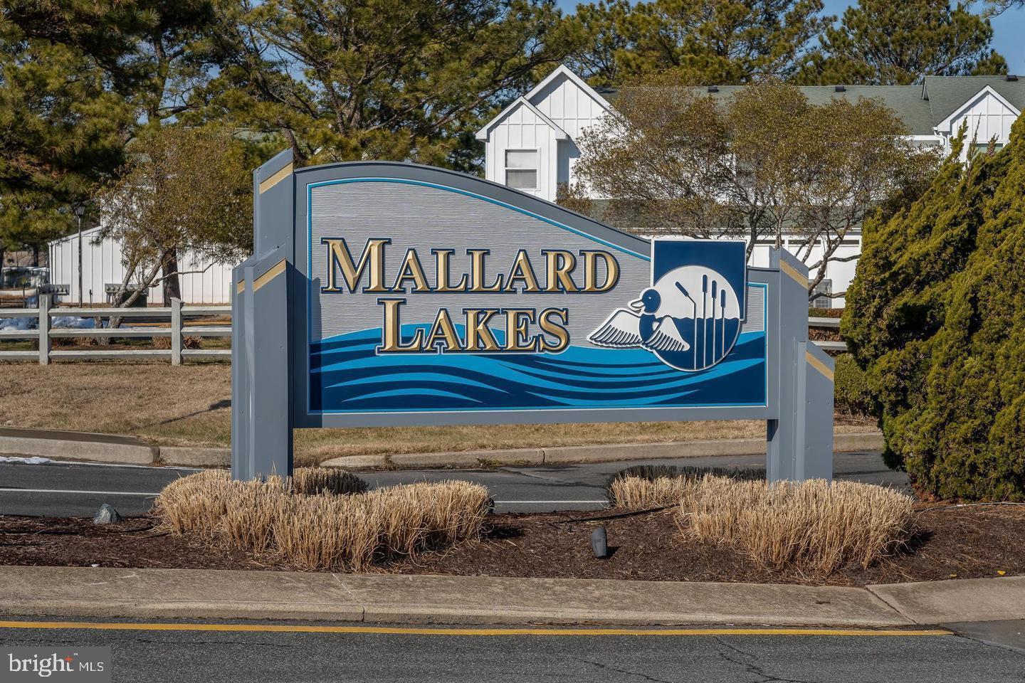 Reduced! The seller will consider holding financing with considerable amount down and an acceptable offer. Welcome to 37781 Heron Ln #434, a beautiful, newly updated townhome with a tranquil view of one of the many ponds throughout  the desirable Mallard Lakes community in Selbyville, DE—a charming coastal Delaware beach town just minutes from Fenwick Island and Ocean City, MD. This area offers the perfect blend of small-town charm and beach town energy, with walkable eateries, and easy access to sandy shores, boating, and fishing. This attractive home  boasts a spacious open-concept living, filled with abundant natural light. There is LVP flooring on the first floor and recently added LVP in the bedrooms and closets. Featuring an accommodating kitchen with newly painted cabinets a granite counter top, bluetooth ceiling fan and a convenient breakfast bar, ideal for casual dining or entertaining guests while preparing a delicious meal. The combined living and dining room is well lit and spacious, perfect for accommodating your beach guests. The living/dining room opens up to the gorgeous screened in porch . Two generously sized bedrooms provide ample space and comfort for resting up after your sun-filled beach day and are complemented by plenty of closet storage for convenient living. The full bath on the second-floor  features a soaking tub and large shower, newer vanity and lighting. The just completed renovations include new flooring and painting throughout, new light fixtures and ceiling fans, and updated bathrooms. The HVAC and Hotwater Heater are just a few years old.  From your private sidewalk you can hangout on you front porch and watch the tennis players.  Convenient outdoor shower and plenty storage for all of your beach gear and bikes.  Life at Mallard Lakes is truly resort-style, with an array of amenities to enhance your lifestyle. Residents enjoy outdoor pools, relaxing jacuzzis, pickleball and tennis courts, shuffleboard, walking trails, basketball and volleyball courts, playgrounds, horseshoe pits, a panoramic viewing tower, and even kayaking areas. Whether you're looking for relaxation or recreation, this community has something for everyone. Perfect for year-round living or as a weekend beach getaway,