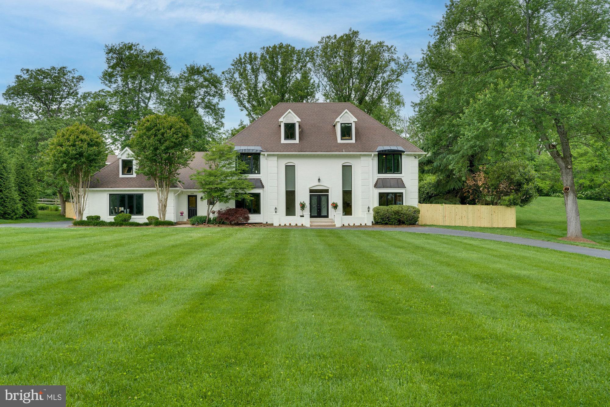 Welcome to Carriage Hill! This stunning 4 bedroom, 4.5 bathroom French-style estate on a private 0.95 acre lot offers the ultimate in luxury living. Inside, you'll find 6,454 finished square feet, 10-foot ceilings, a 2 story foyer, hardwood floors, a main-floor mudroom, an office/library, a family room with a fireplace, and a gourmet kitchen boasting top-of-the-line stainless steel appliances, including an 8-burner Viking stove, 2 dishwashers, granite countertops, and a Sub-Zero fridge. Upper level owner's suite with a fireplace and spa-like en suite bathroom. On the lower level, you'll find a theater room, an extended basement wet bar with a dishwasher, brand new carpeting, a recreation room, and recessed lighting throughout. A true backyard retreat with a fenced-in heated pool guarantees year-round enjoyment, while the nearly one-acre lot offers privacy and ample space for outdoor activities. There's a three-car garage with additional parking for multiple vehicles, an automatic backup generator, and R49 insulation in the attic for exceptional energy efficiency. This meticulously maintained home underwent extensive renovations in 2012, including all new windows, doors, roof, and HVAC system. In 2024, the interior has been freshly painted, brand new carpet has been installed throughout, and the exterior has been enhanced with a brand new fence, a new sump pump, and new exterior doors on the garage and pool house. Peace of mind comes with a whole-house dehumidifier, a two-zone HVAC system with a fresh air intake system to improve indoor quality, and a backup generator to ensure comfort even during power outages.  Great Vienna location within top rated Madison pyramid and a short distance to W+OD Trail.
