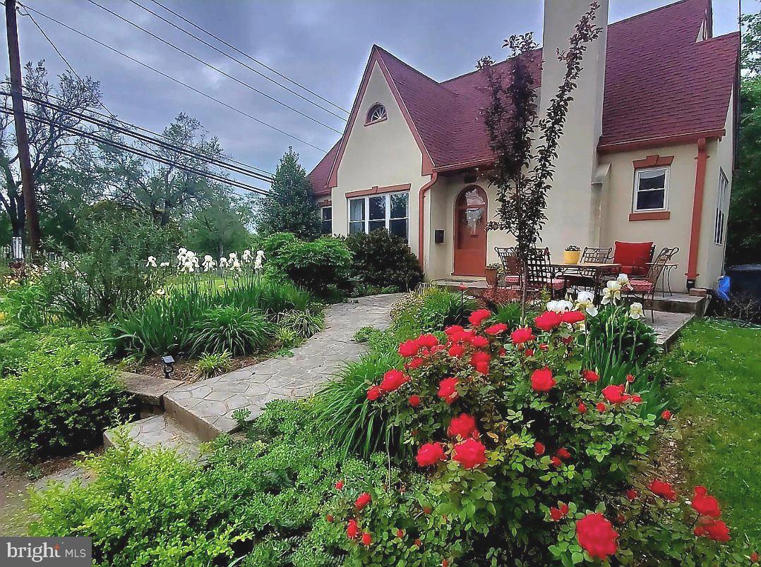 Charming Cape Cod in the Heart of Downtown Winchester! This beautifully maintained 3-bedroom home seamlessly blends timeless character with luxurious modern updates. Hardwood floors grace the main level, complementing a fully renovated kitchen featuring high-end finishes and ample table space. The bathrooms have been thoughtfully remodeled with upscale materials, new flooring and elegant touches throughout. A cozy gas fireplace adds warmth and ambiance, while the upper-level loft—complete with new carpet—offers flexible living space perfect for a home office, playroom, or guest retreat. Enjoy year-round comfort with an instant hot water heater and low-maintenance living thanks to the durable rubber stucco exterior. Step outside to the newly enhanced screened-in porch, now upgraded with windows to create a bright and breezy three-season room—ideal for relaxing or entertaining. The fenced backyard offers privacy and space to enjoy, complete with several mature apple and peach trees for a touch of homestead charm. Situated on a desirable corner lot, this home offers both outdoor appeal and prime location just moments from the vibrant heart of Downtown Winchester. An unfinished basement provides excellent storage or potential for future expansion. Don’t miss the opportunity to own this downtown gem!