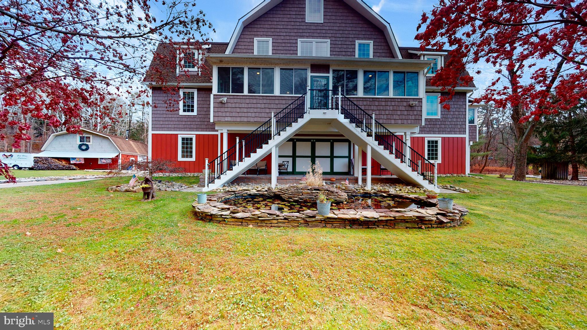 Welcome to 901 Crum Creek Road - a rare opportunity to own a private retreat on nearly three acres while remaining just minutes from everything Delaware County has to offer.  Tucked away in a secluded setting, this exceptional property provides the peace and privacy of country living with convenient access to major roadways,  shopping, dining, parks and Philadelphia.  One of the property's most valuable features is its location within  Marple Township, offering Marple Township taxes and enrollment in the highly regarded Marple Newtown School District.  Designed for making memories, the expansive grounds offer endless opportunities for recreation and entertaining.  Whether it's children riding  dirt bikes through the property, fishing in nearby Crum Creek, gathering around campfires under the stars, hosting outdoor celebrations or simply exploring nature in your own backyard, this is the kind of property that becomes the backdrop for a lifetime of family experiences.  This home itself reflects a level of craftsmanship rarely found  in today's construction.  Built to stand the test of time, it showcases the quality, durability and character that modern homes often lack.  From its solid construction to its timeless appeal, this is a residence that inspires confidence and pride of ownership.  Adding to the property's charm are breathtaking views of a picturesque 19th century farmhouse, perfectly framed by spectacular sunsets that paint the sky each evening.  The setting feels like a scene from a postcard while remaining remarkably close to everyday conveniences.  For the hobbyist, car enthusiasts, business owners or multi-generational families, the detached garage and separate living quarters provide exceptional flexibility.  This additional living space is ideal for in-laws, extended family, a home office or potential income.  Properties offering this combination of privacy, acreage, location, craftsmanship, recreational opportunities and versatile living arrangements are increasingly difficult to find.  901 Crum Creek Road is more than a home....it's a lifestyle.